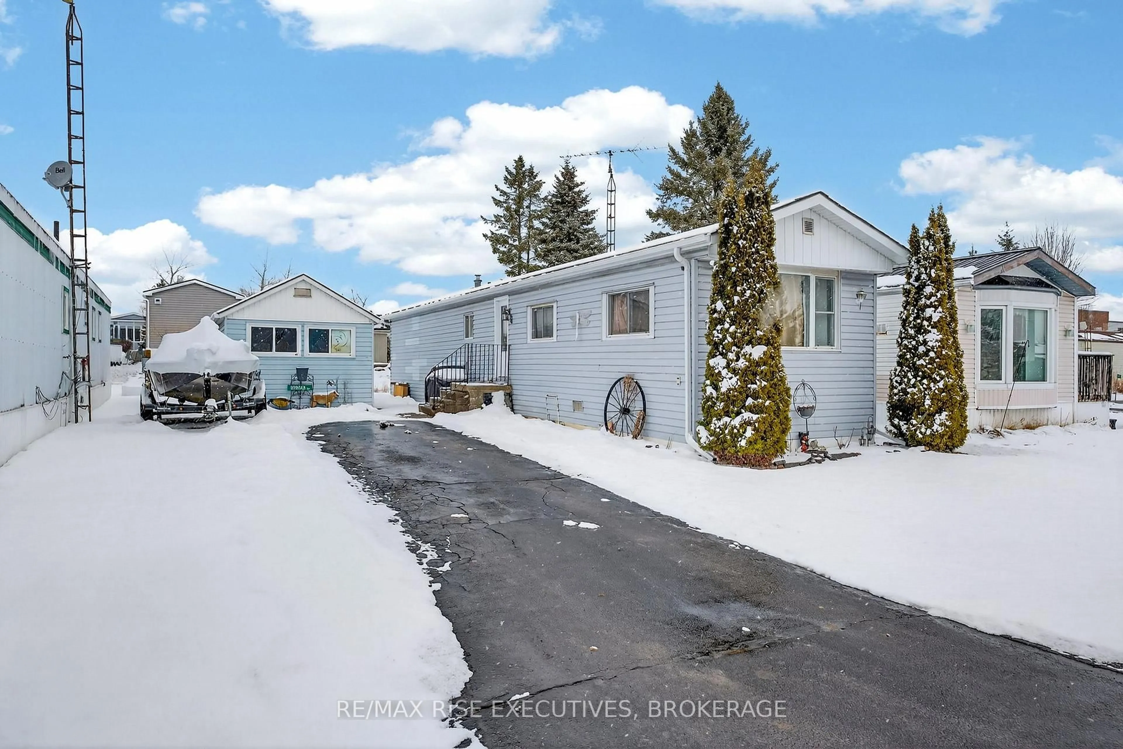 A pic from outside/outdoor area/front of a property/back of a property/a pic from drone, mountain view for 4 Cedar St, Greater Napanee Ontario K7R 3L1