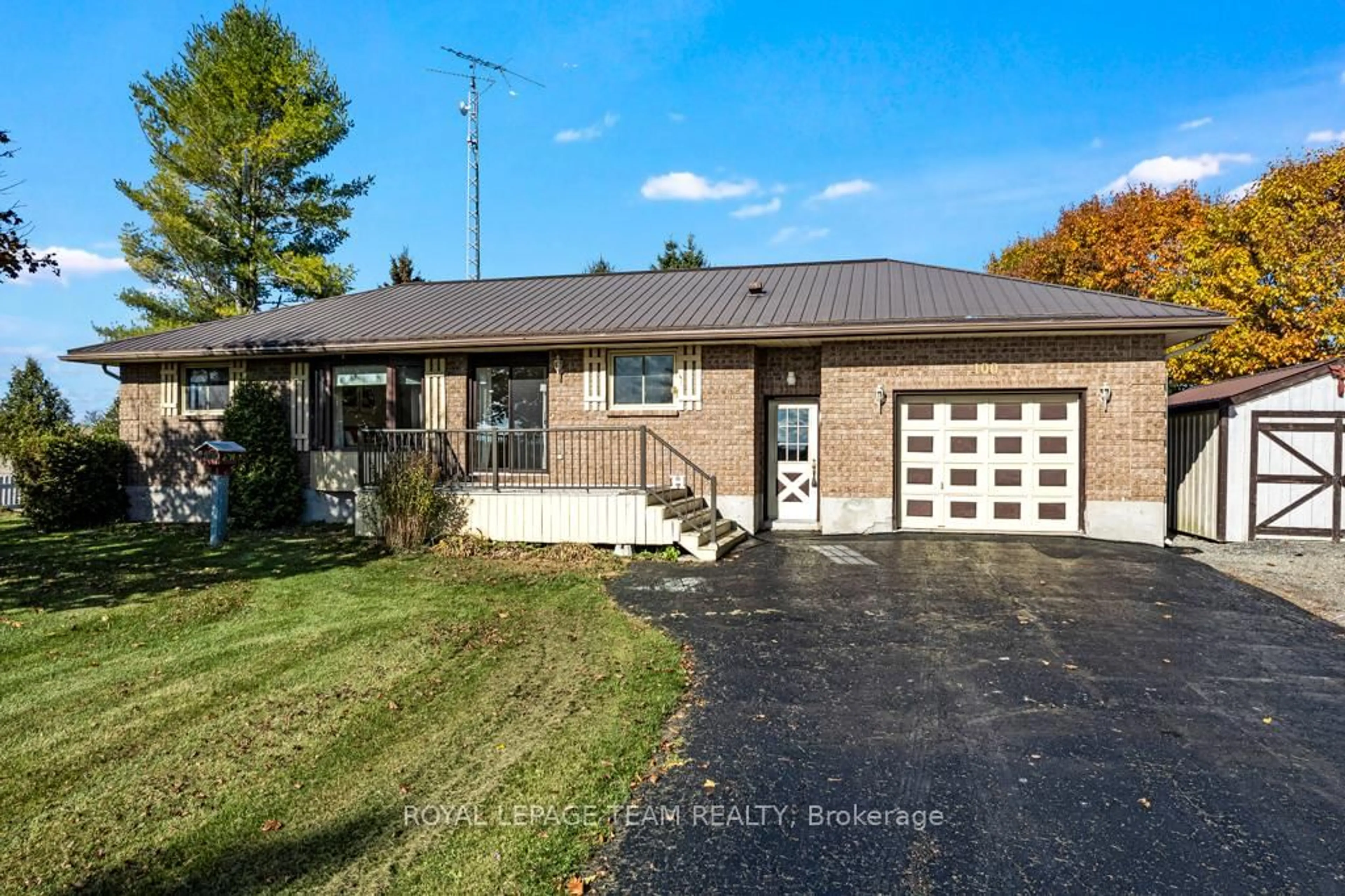 Home with vinyl exterior material, street for 100 County Road 21 Rd, Edwardsburgh/Cardinal Ontario K0E 1X0
