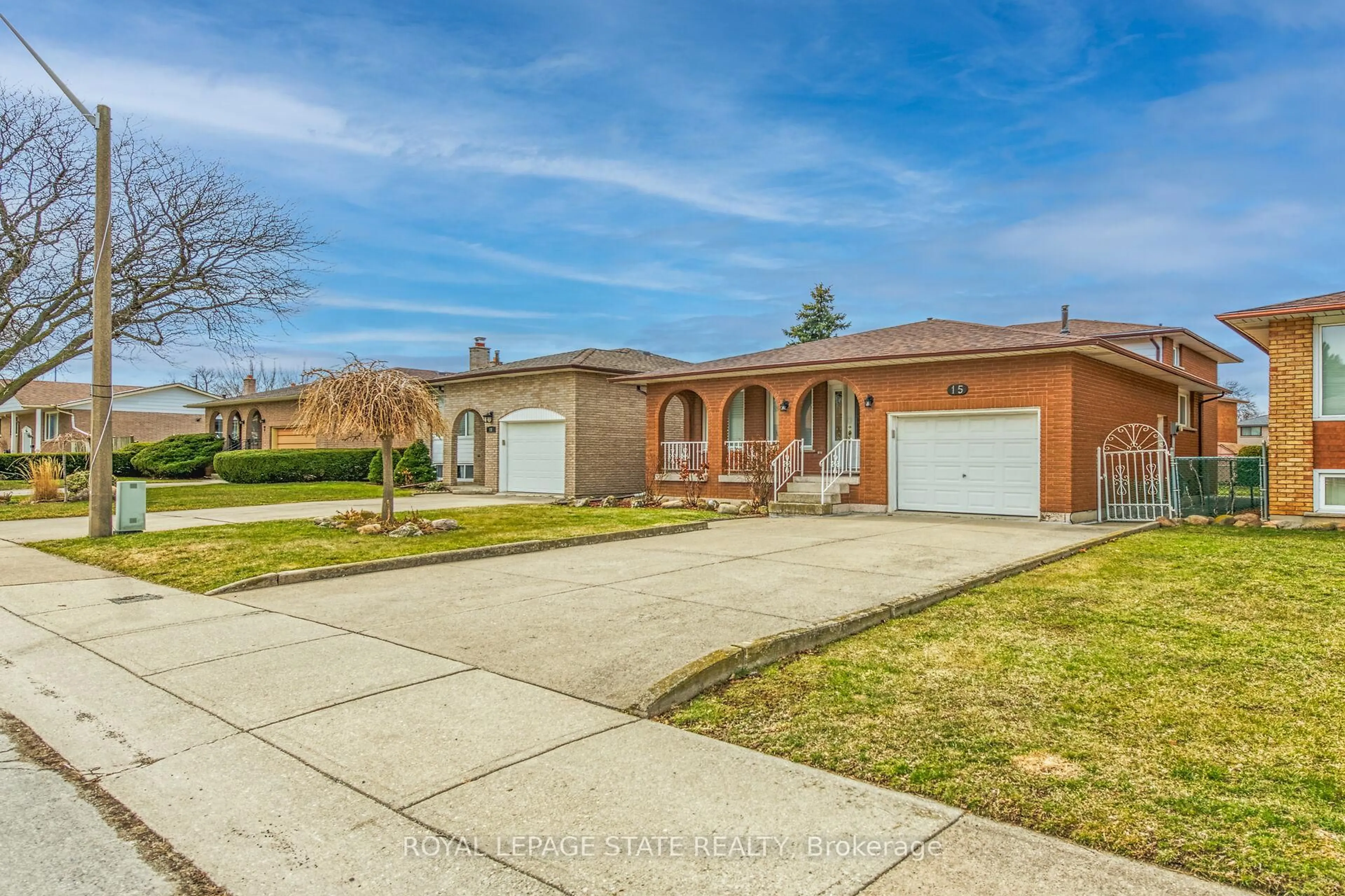 Home with brick exterior material, street for 15 Fairington Cres, Hamilton Ontario L8E 3N3
