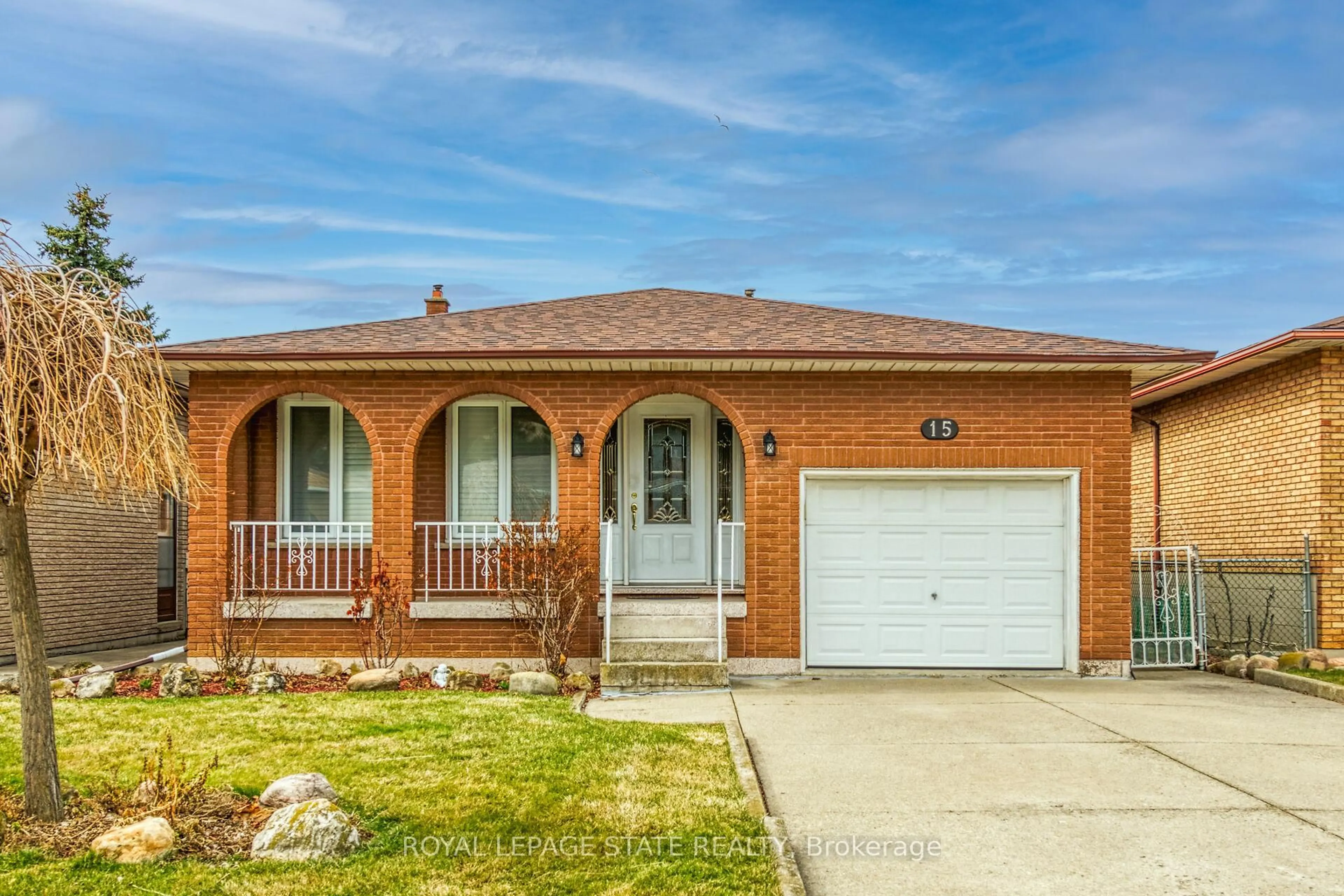 Home with brick exterior material, street for 15 Fairington Cres, Hamilton Ontario L8E 3N3