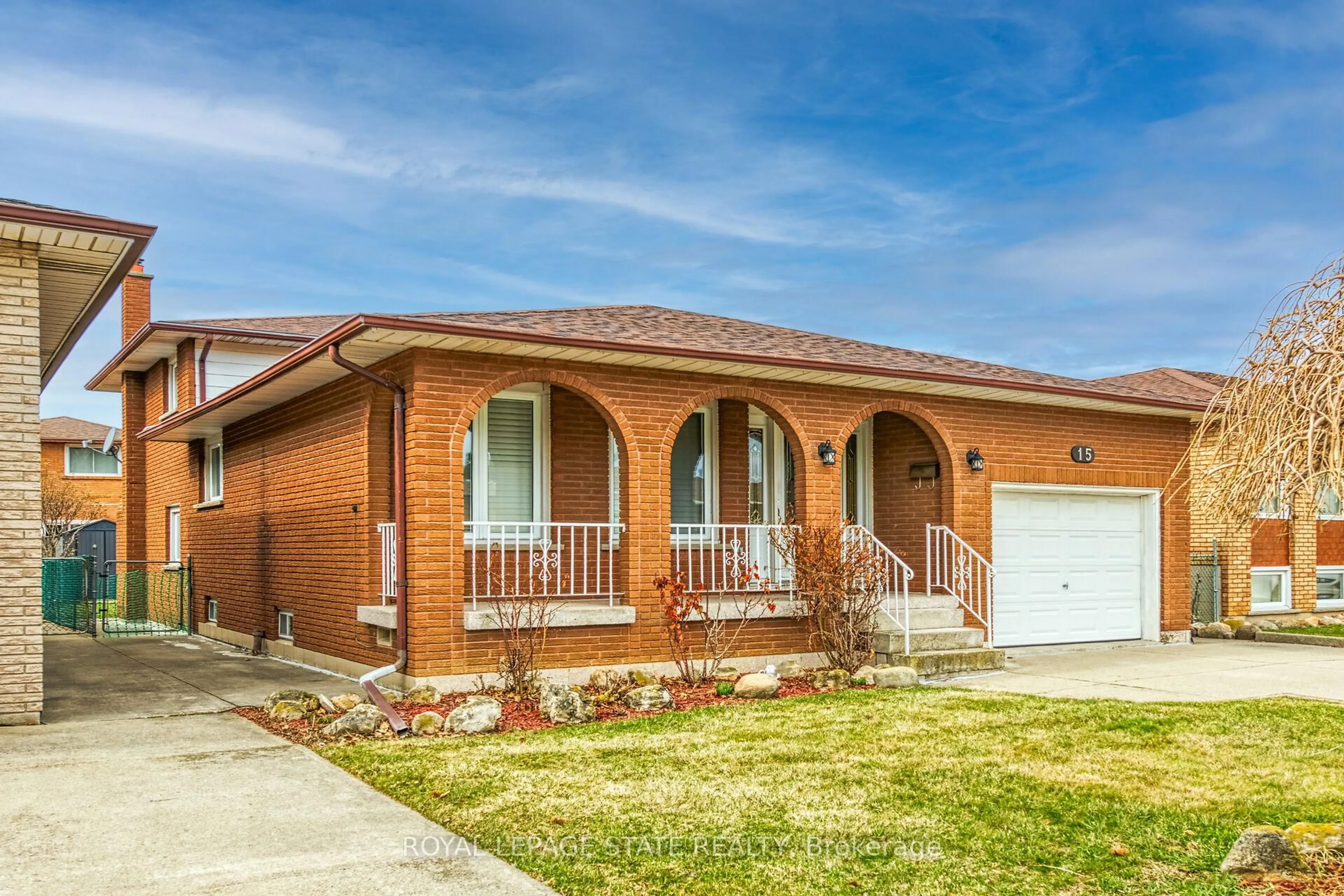 Home with brick exterior material, street for 15 Fairington Cres, Hamilton Ontario L8E 3N3