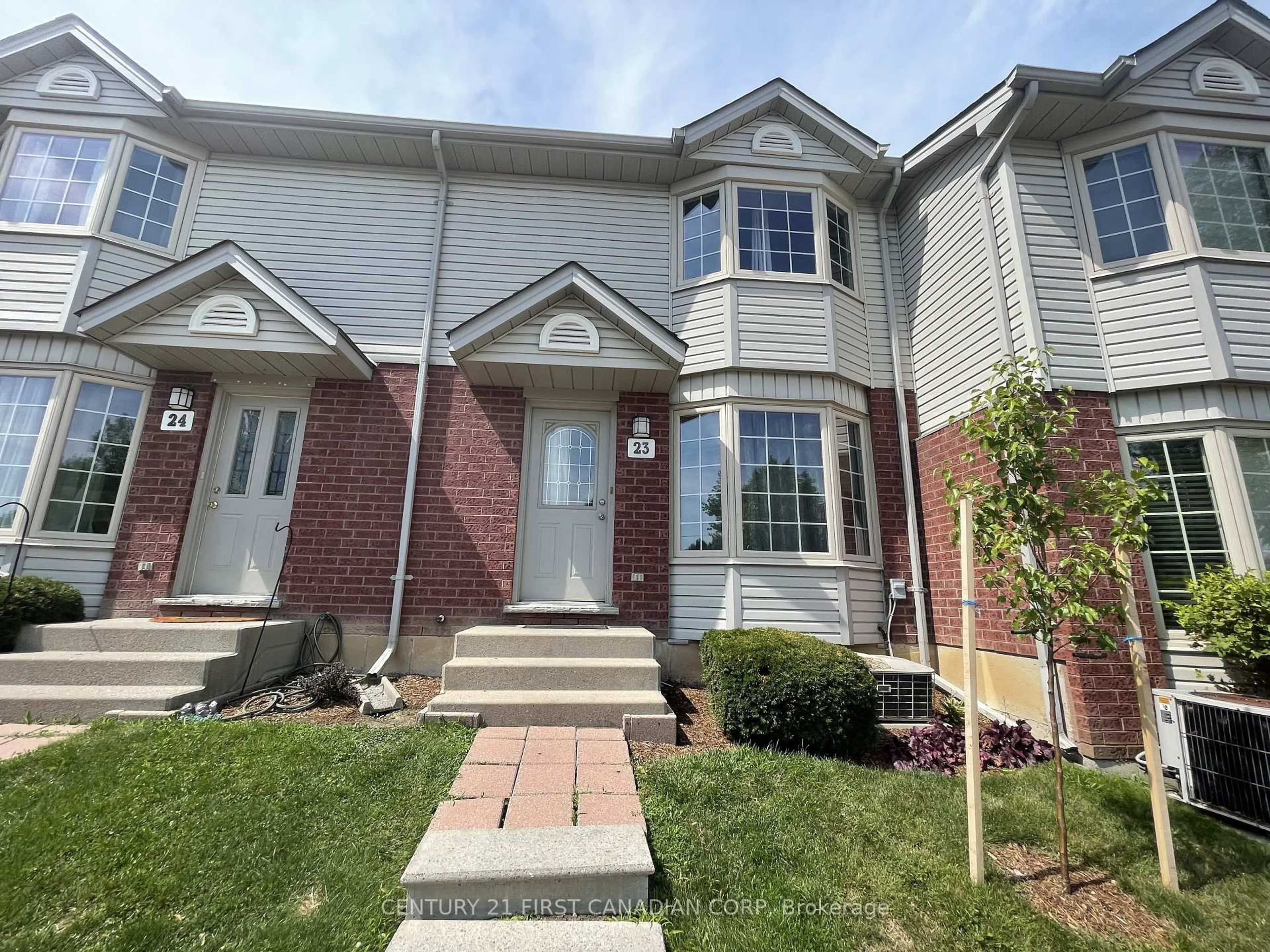 Home with brick exterior material, street for 70 Chapman Crt #23, London North Ontario N6G 4Z4