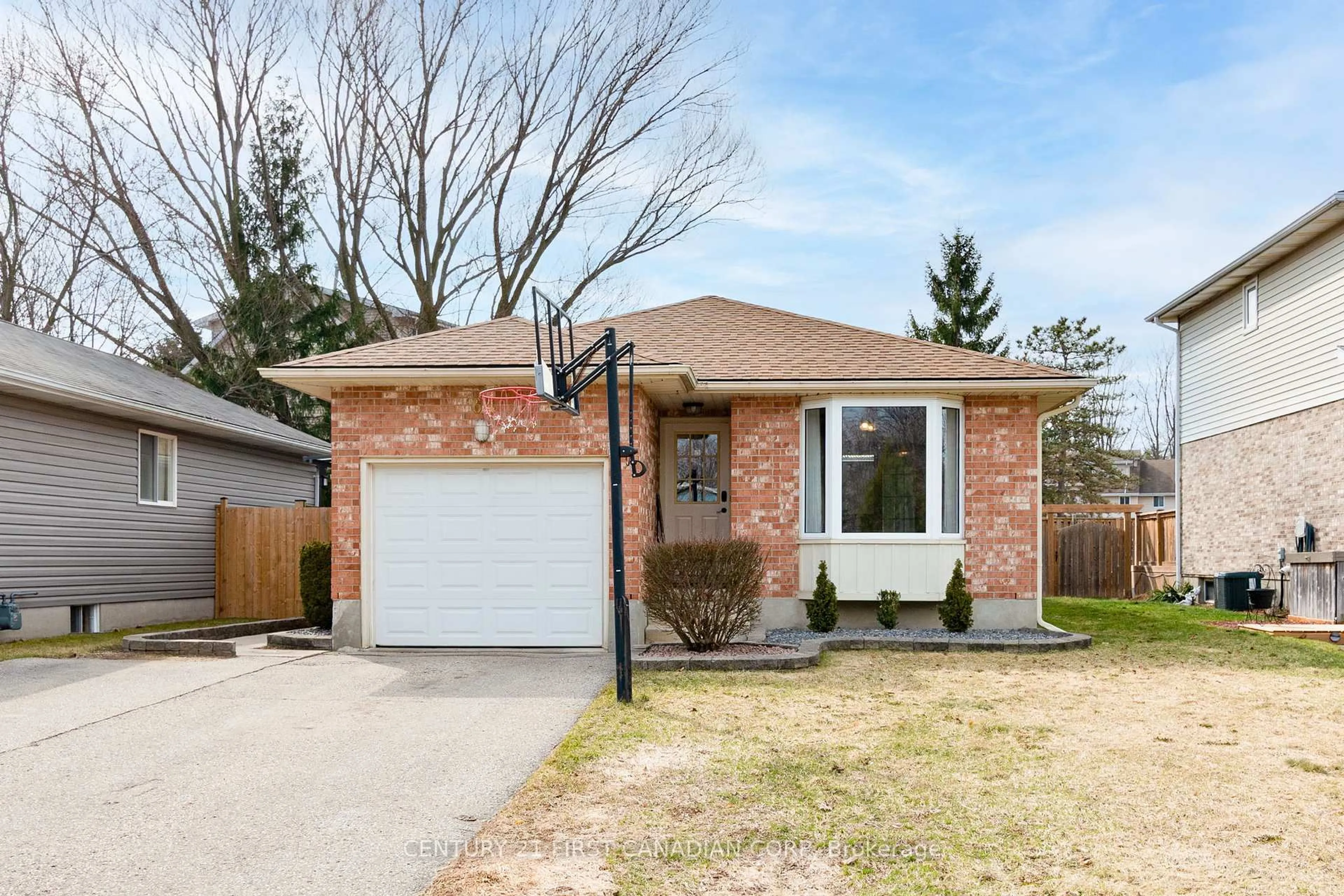 Home with brick exterior material, street for 64 Melanie Dr, Aylmer Ontario N5H 3G5
