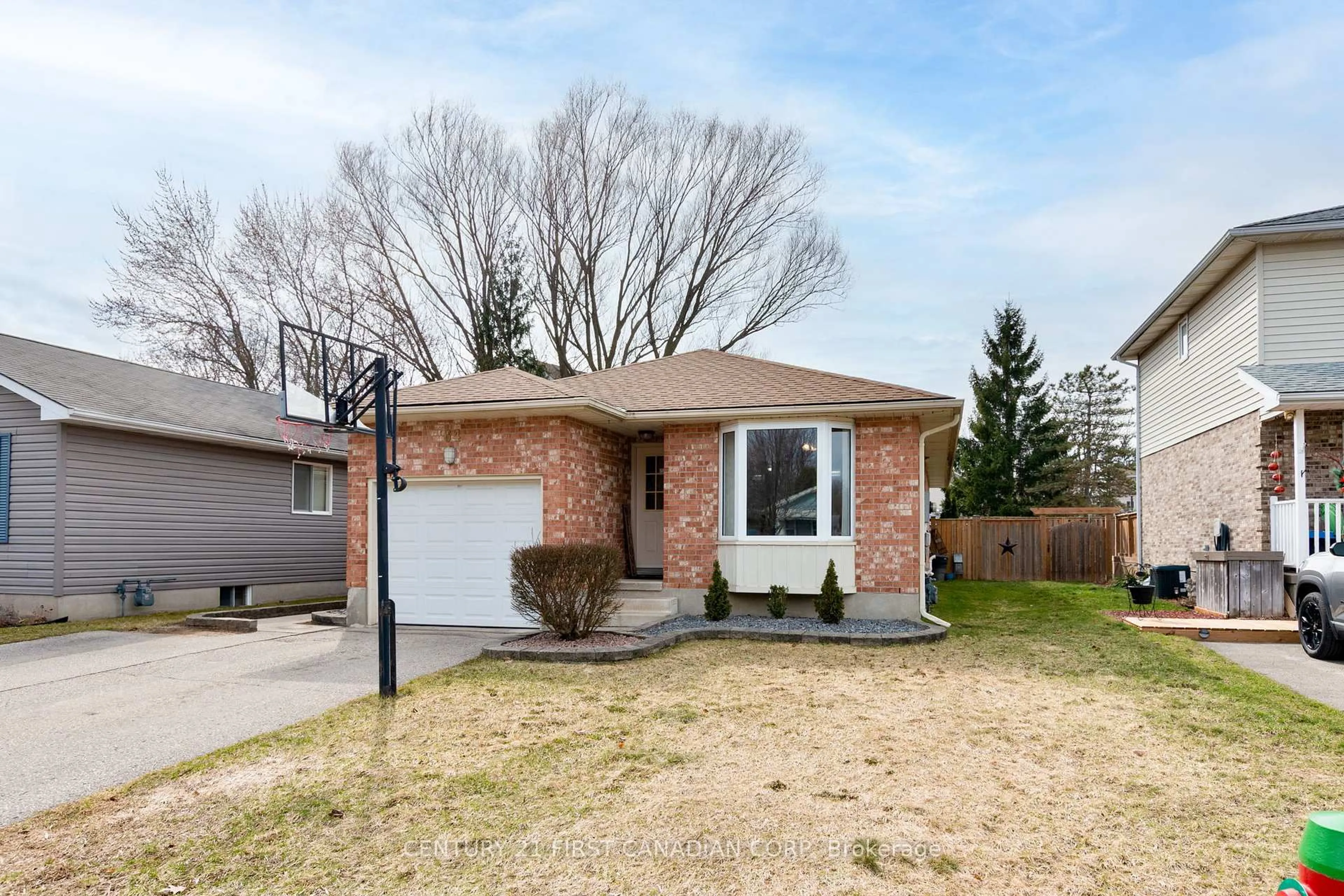 Home with brick exterior material, street for 64 Melanie Dr, Aylmer Ontario N5H 3G5