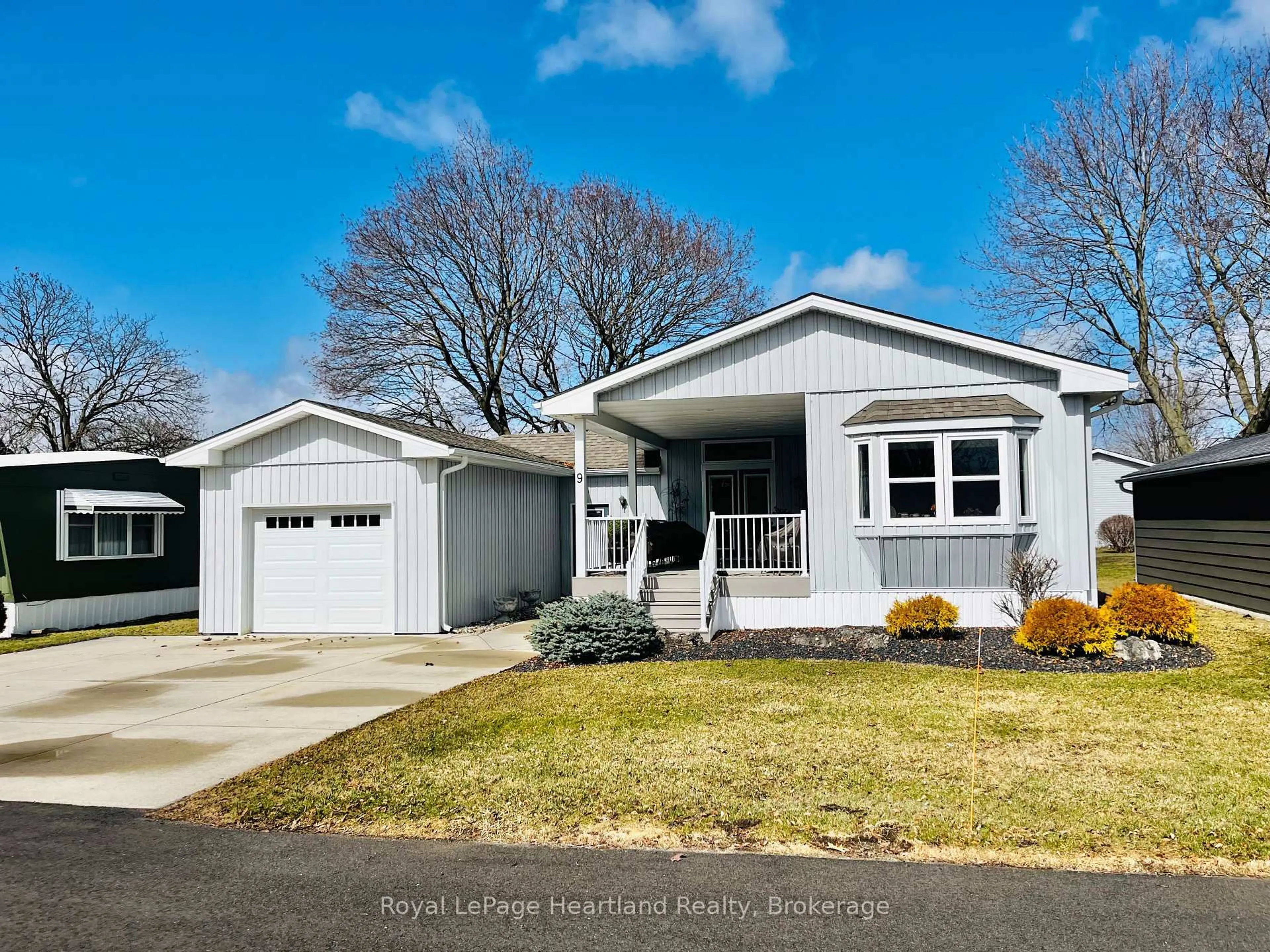 Home with vinyl exterior material, street for 9 VELMA St, Strathroy-Caradoc Ontario N7G 3L2