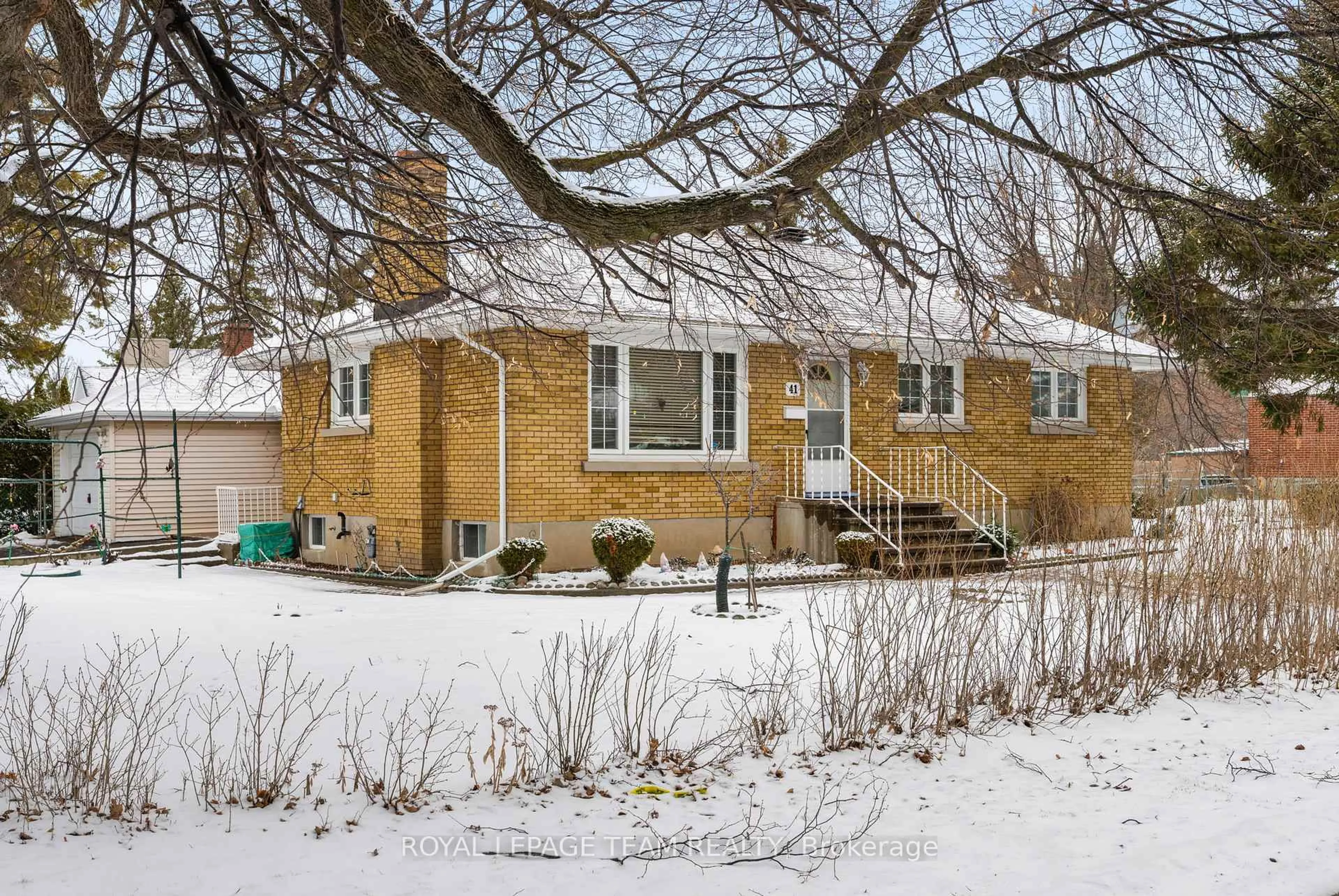 Home with brick exterior material, street for 41 Capilano Dr, Ottawa Ontario K2E 6G3