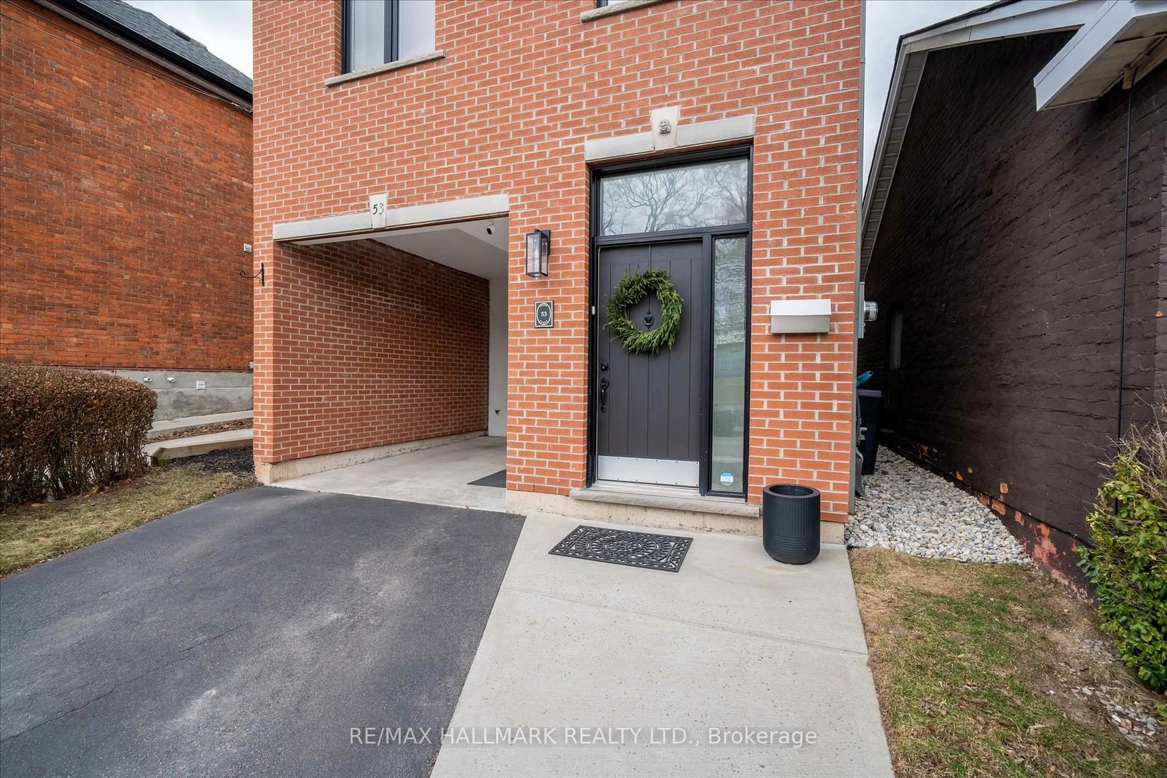 Home with brick exterior material, street for 53 Wood St, Hamilton Ontario L8L 3Y2
