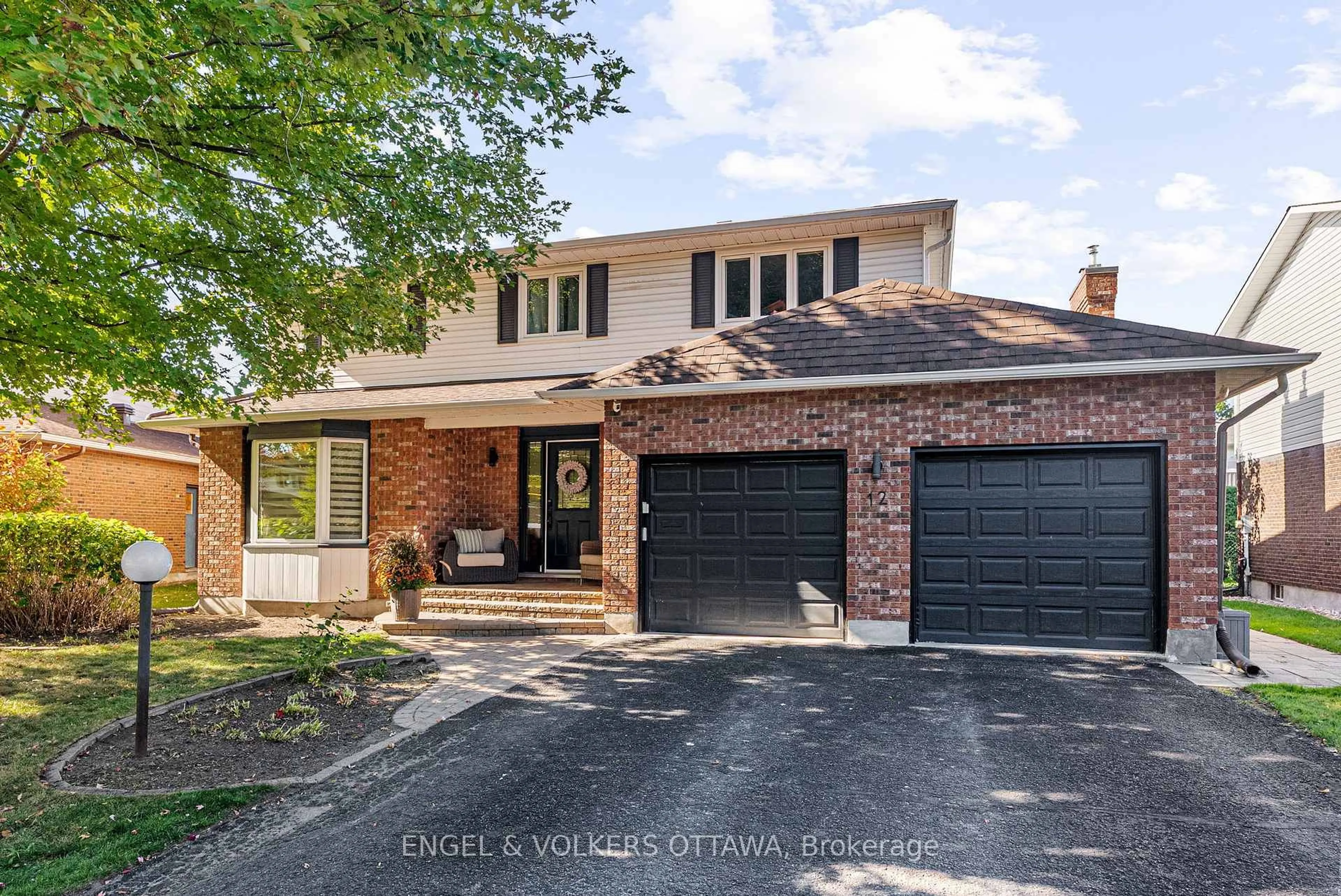 Home with brick exterior material, street for 12 Mancil Dr, Ottawa Ontario K2J 2J5