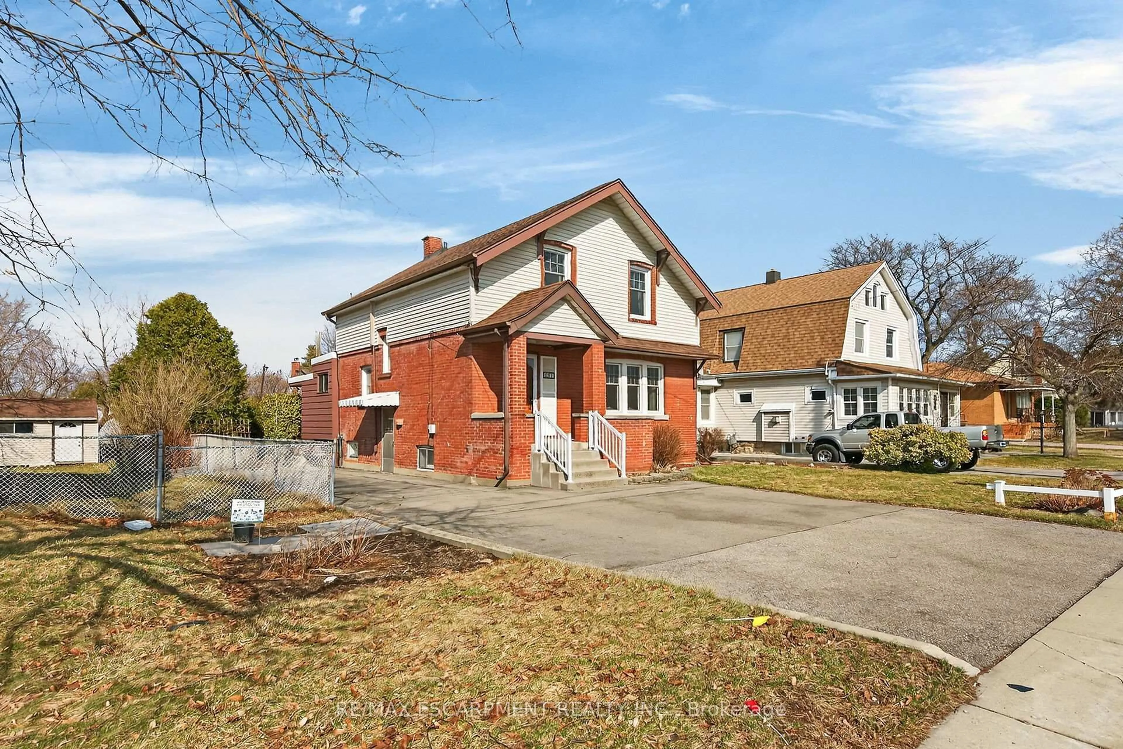 Home with brick exterior material, street for 257 Queensdale Ave, Hamilton Ontario L9A 1L3