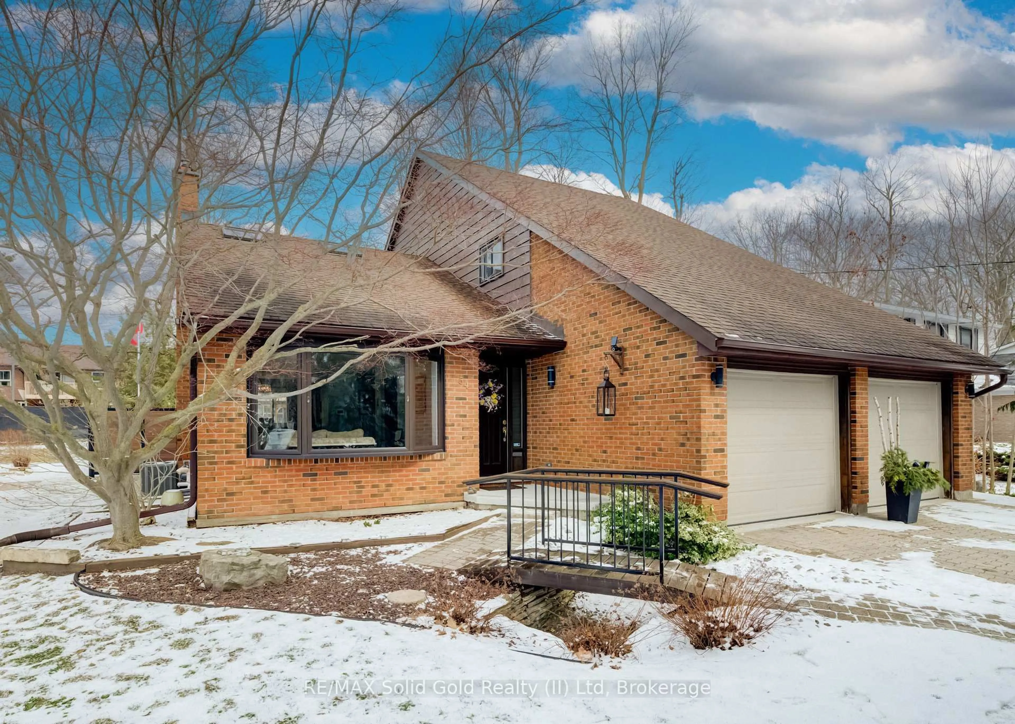 Home with brick exterior material, street for 54 Glenwood Dr, Kitchener Ontario N2A 1H7