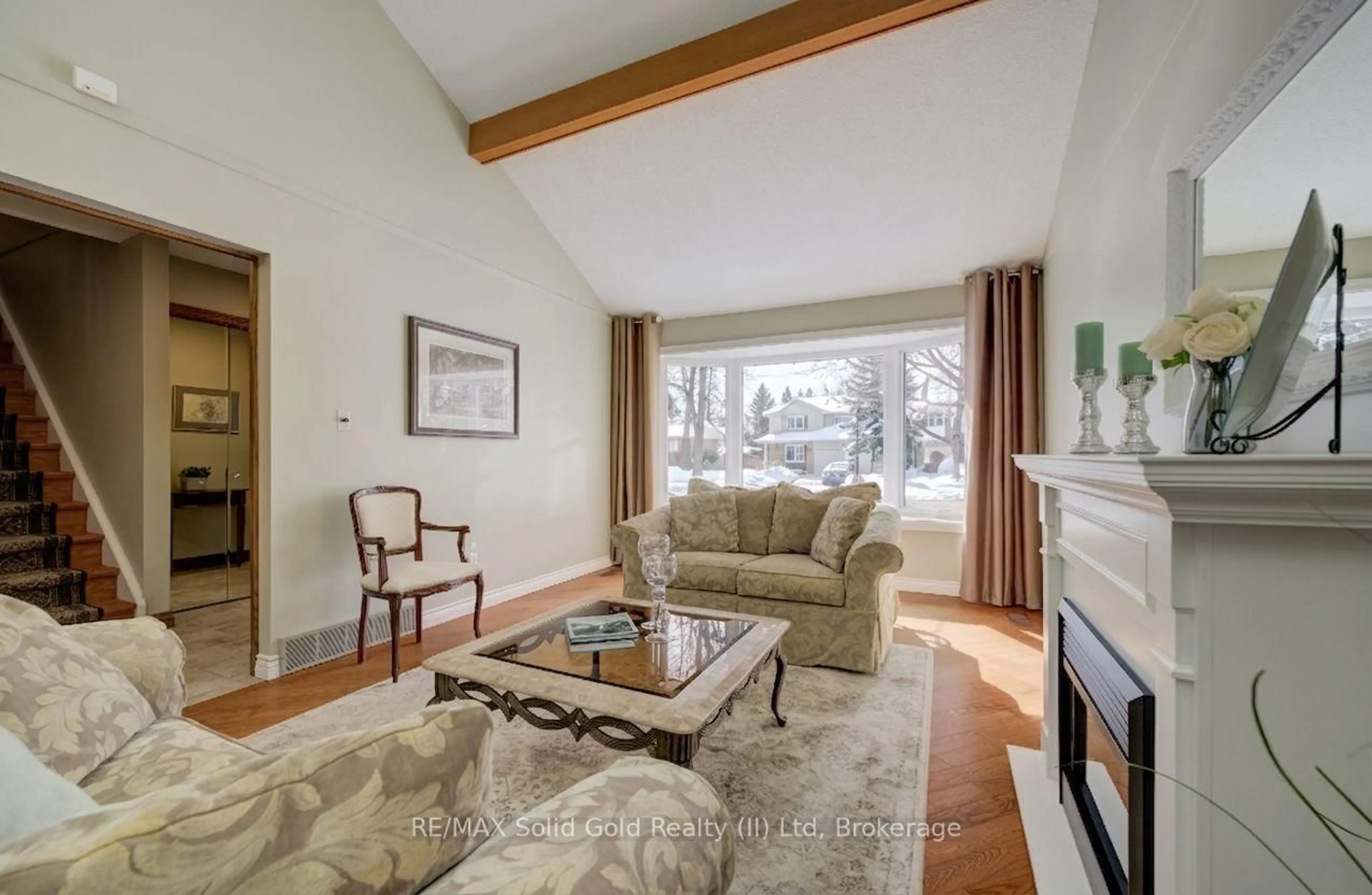 Living room with furniture, wood/laminate floor for 54 Glenwood Dr, Kitchener Ontario N2A 1H7