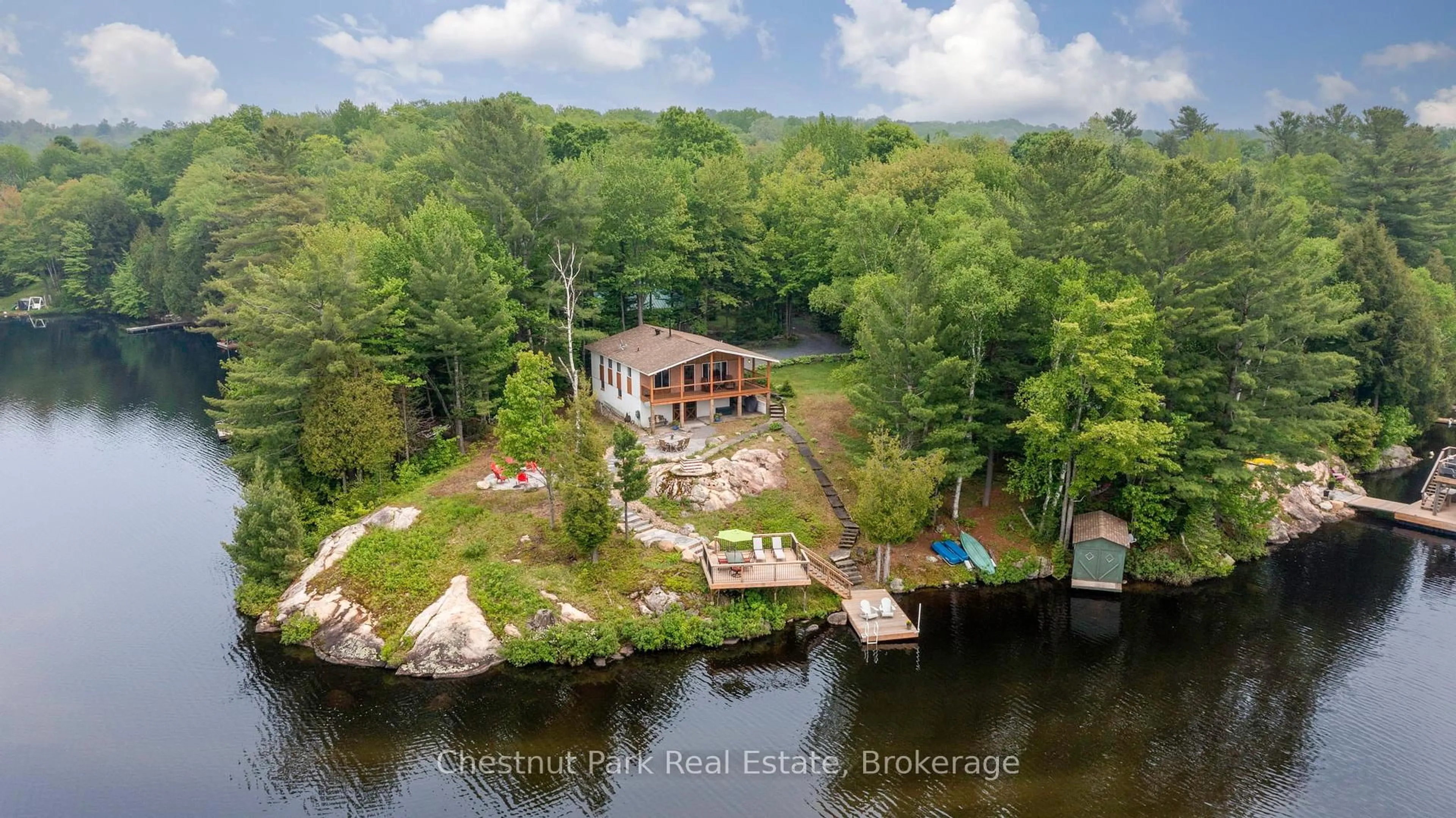 A pic from outside/outdoor area/front of a property/back of a property/a pic from drone, water/lake/river/ocean view for 4 Mallard Lane, Lake of Bays Ontario P0B 1A0