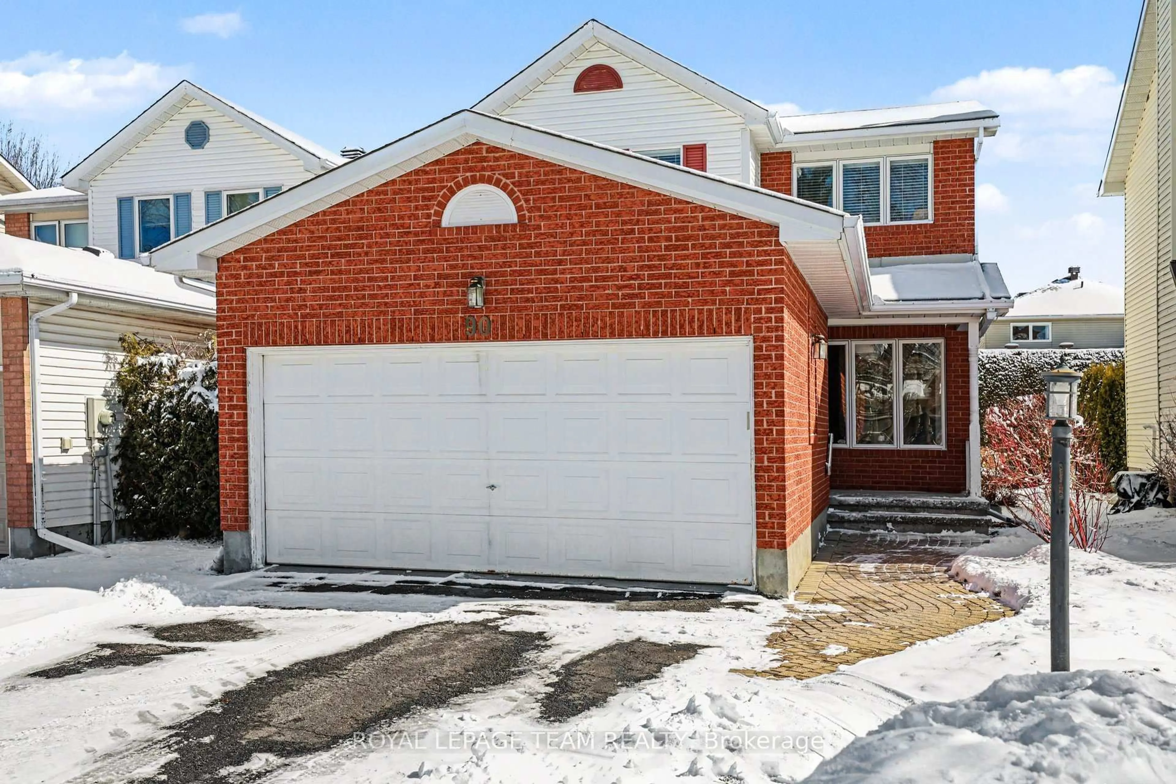 Home with brick exterior material, street for 90 Moresby Dr, Kanata Ontario K2M 2J6