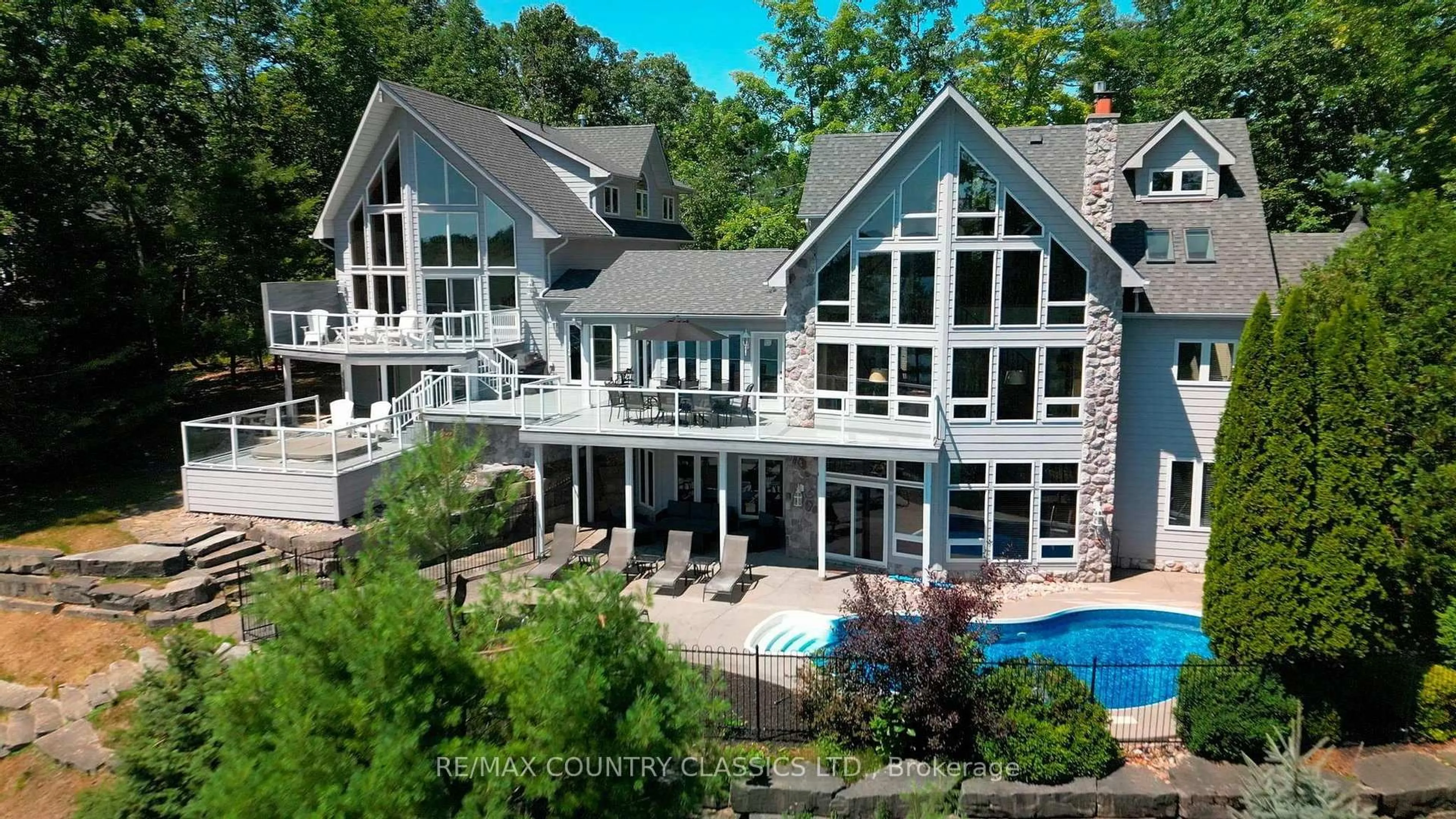 A pic from outside/outdoor area/front of a property/back of a property/a pic from drone, water/lake/river/ocean view for 119 Fire Route 89B, North Kawartha Ontario K0L 1A0