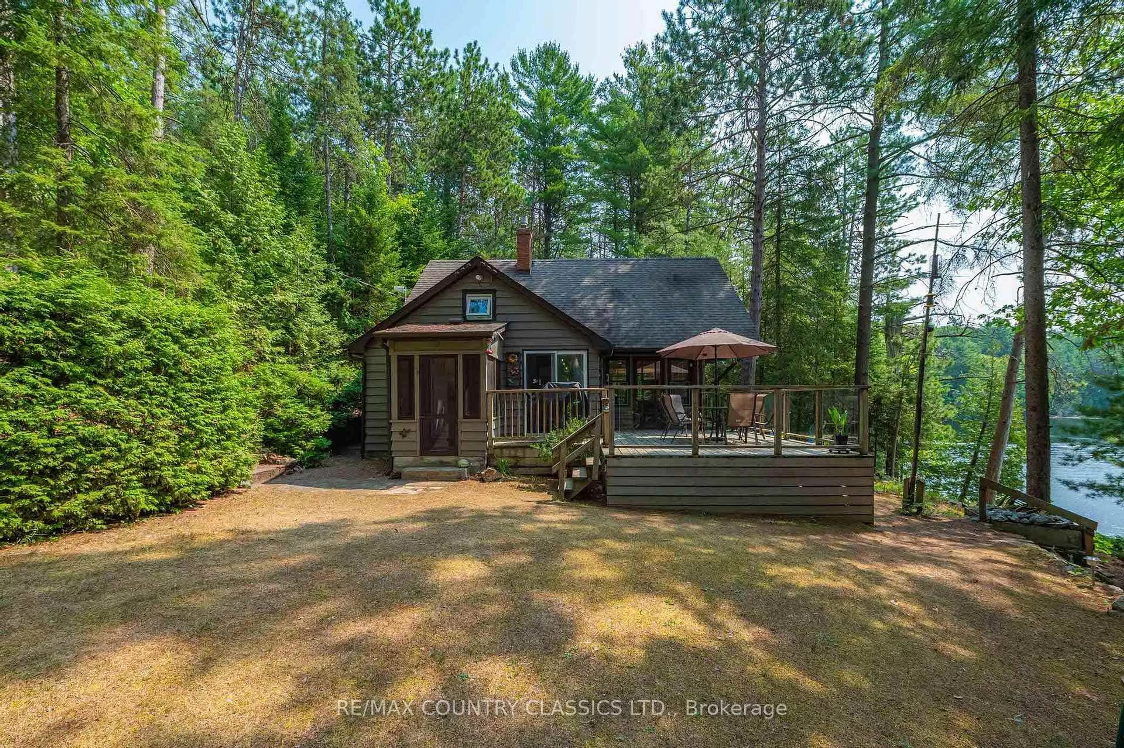 A pic from outside/outdoor area/front of a property/back of a property/a pic from drone, unknown for 118 QUAIL Lane, North Kawartha Ontario K0L 1A0