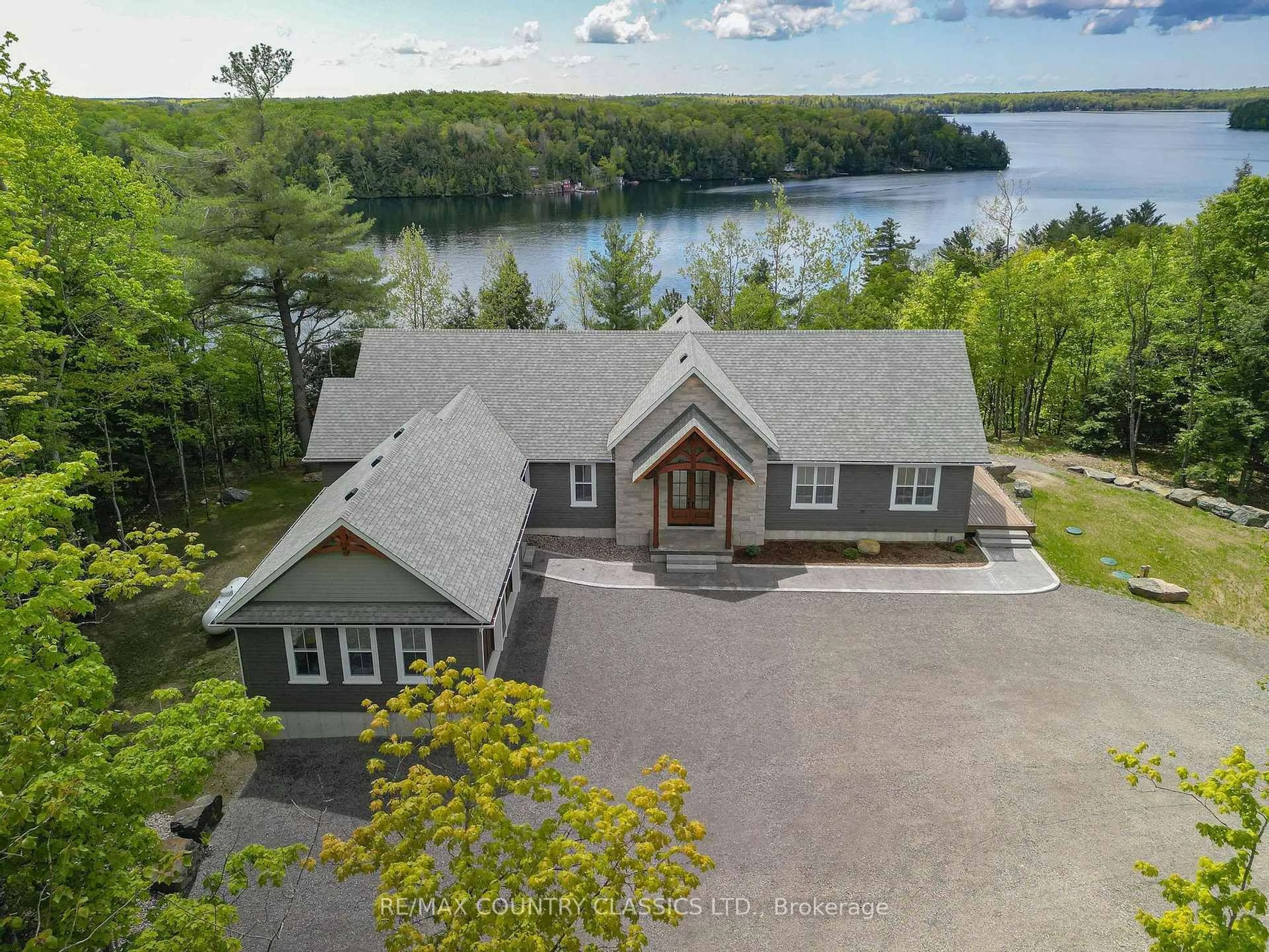 A pic from outside/outdoor area/front of a property/back of a property/a pic from drone, water/lake/river/ocean view for 400 Antelope Tr, North Kawartha Ontario K0L 1A0