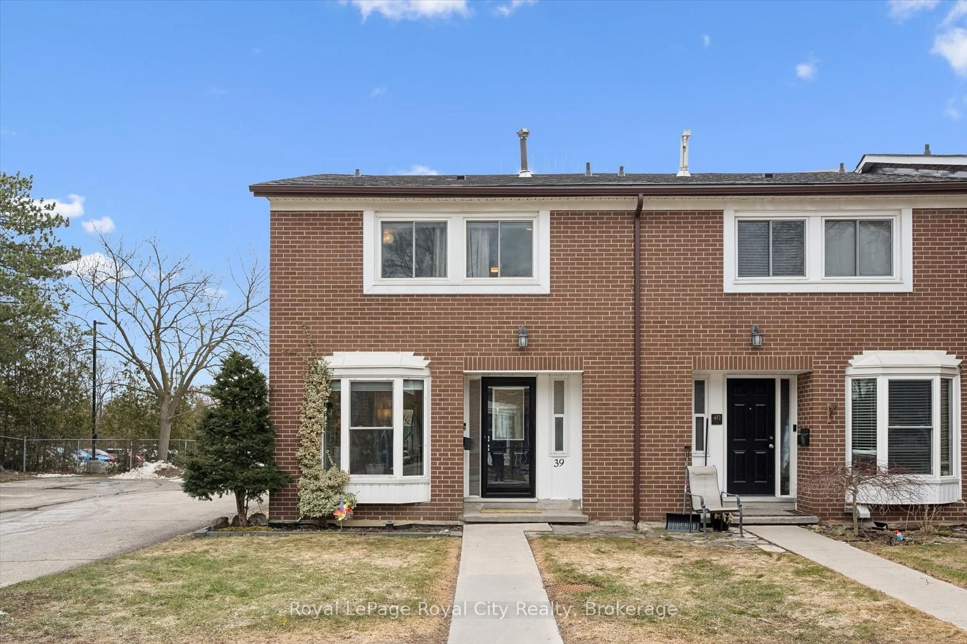 Home with brick exterior material, street for 121 Bagot St #39, Guelph Ontario N1H 5T8