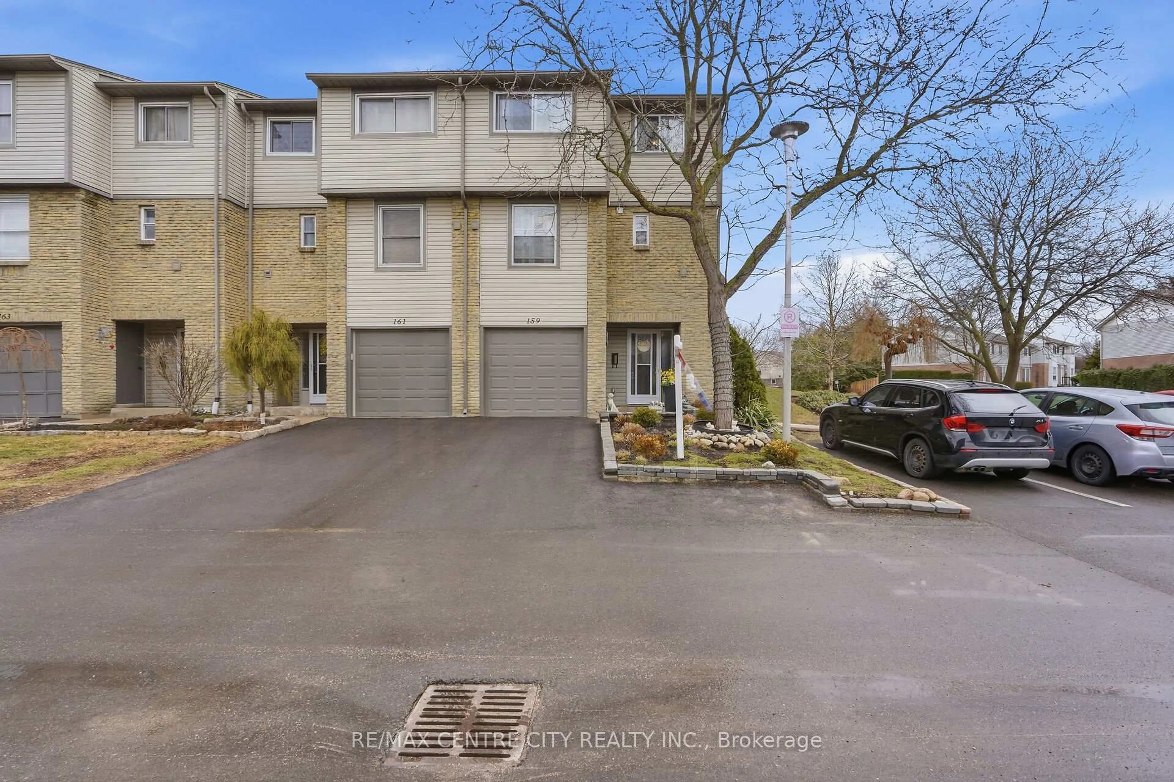 A pic from outside/outdoor area/front of a property/back of a property/a pic from drone, street for 159 Deveron Cres #44, London South Ontario N5Z 4J7