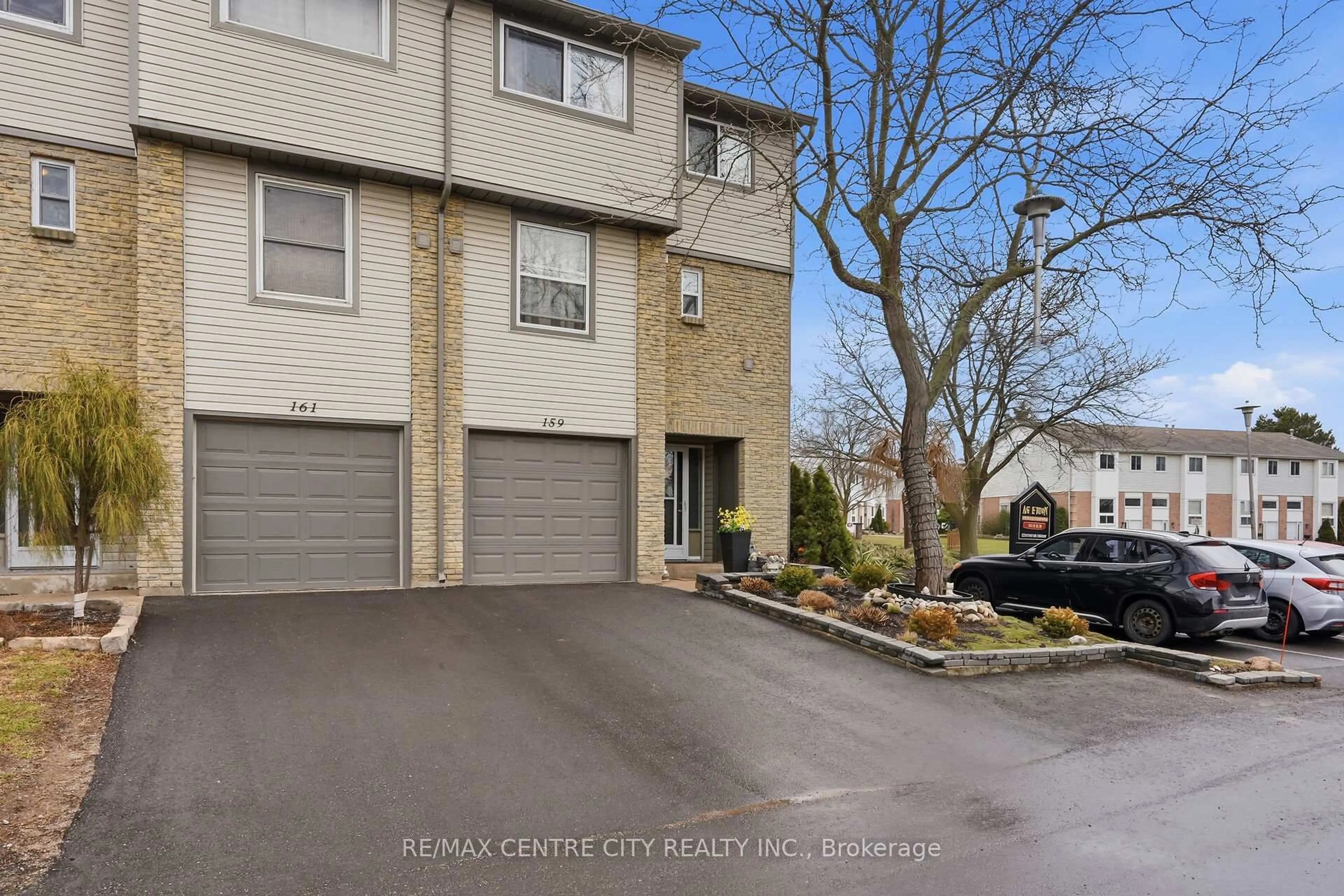 A pic from outside/outdoor area/front of a property/back of a property/a pic from drone, street for 159 Deveron Cres #44, London South Ontario N5Z 4J7