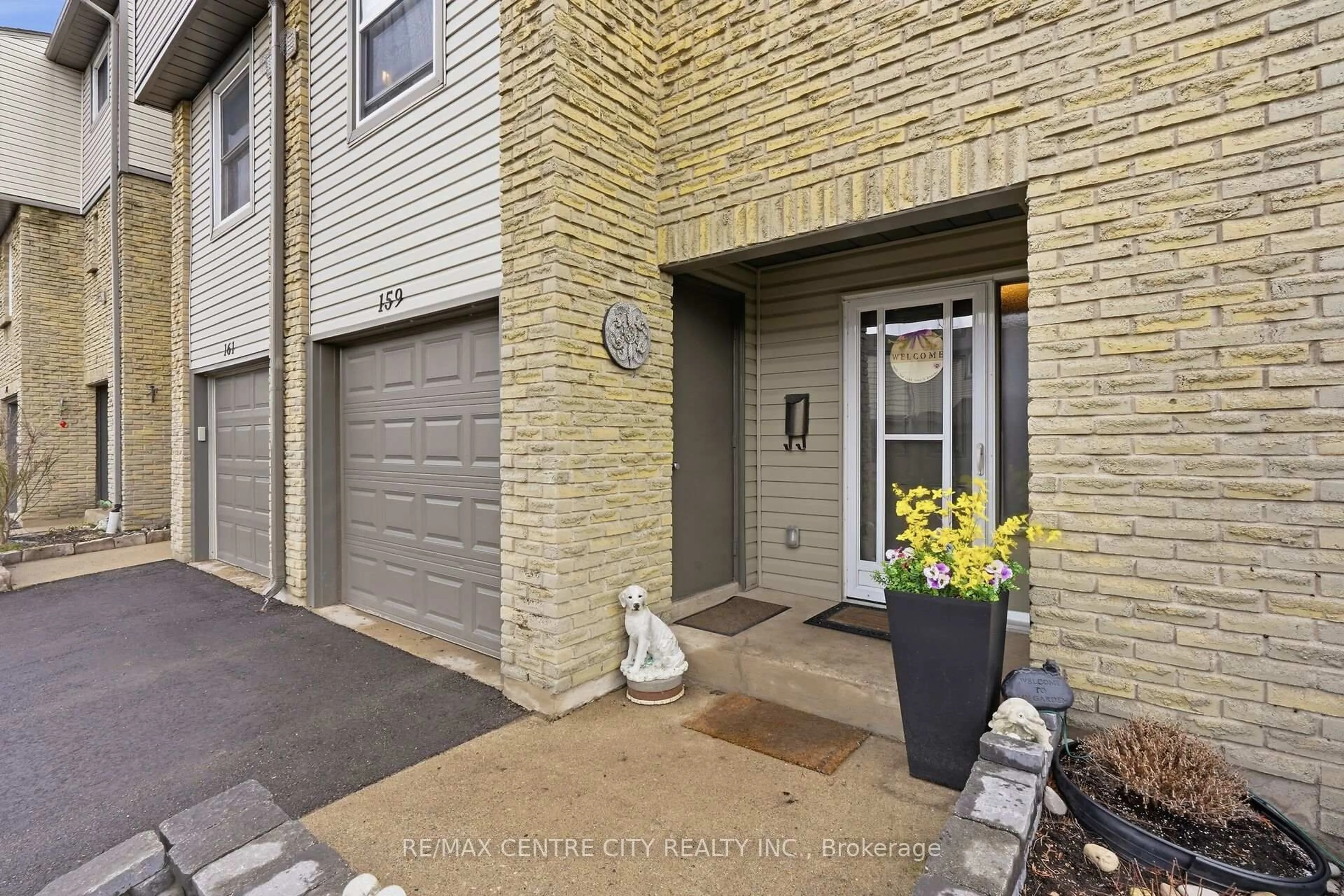 A pic from outside/outdoor area/front of a property/back of a property/a pic from drone, street for 159 Deveron Cres #44, London South Ontario N5Z 4J7