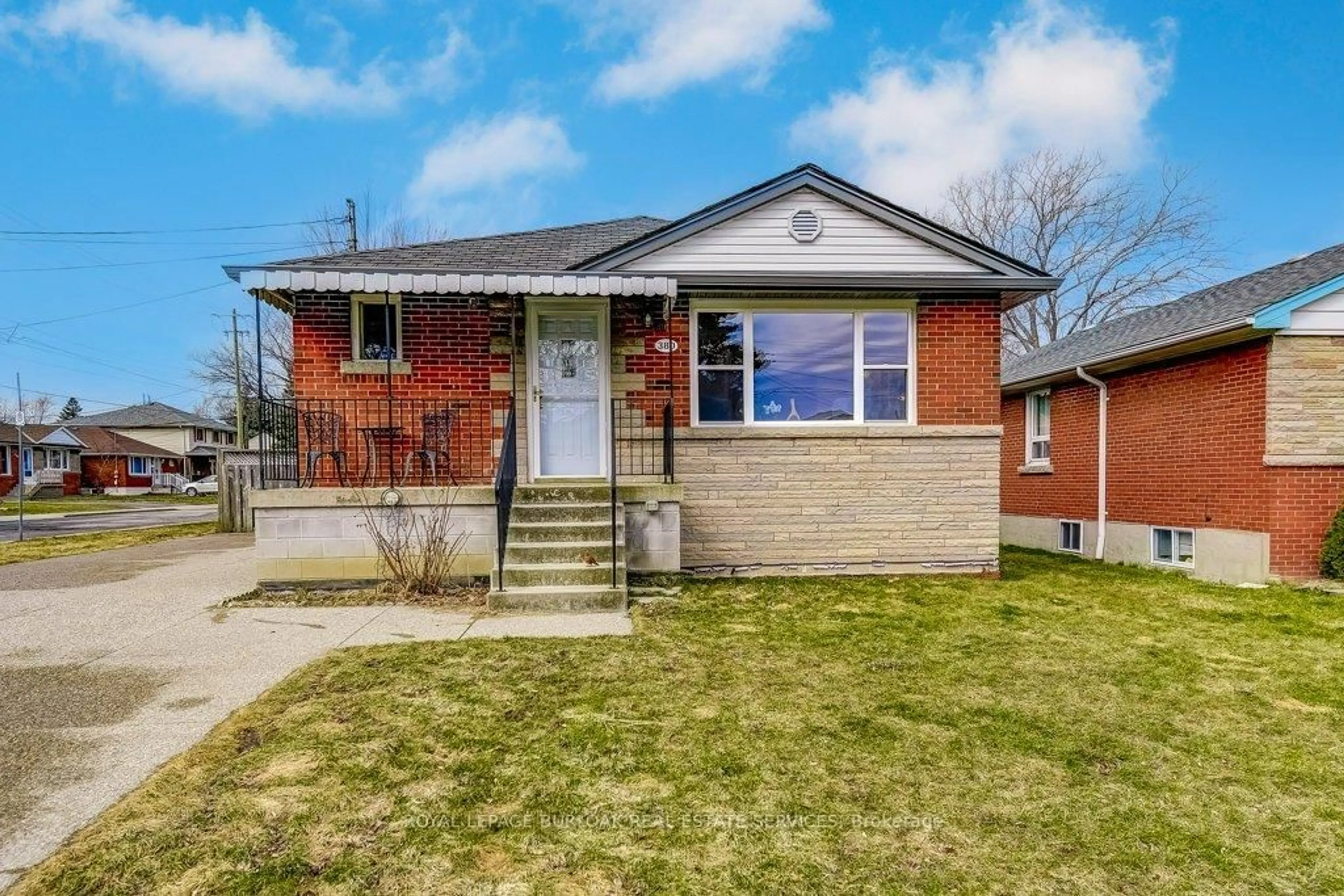 Home with brick exterior material, street for 380 East 42nd St, Hamilton Ontario L8T 3A7