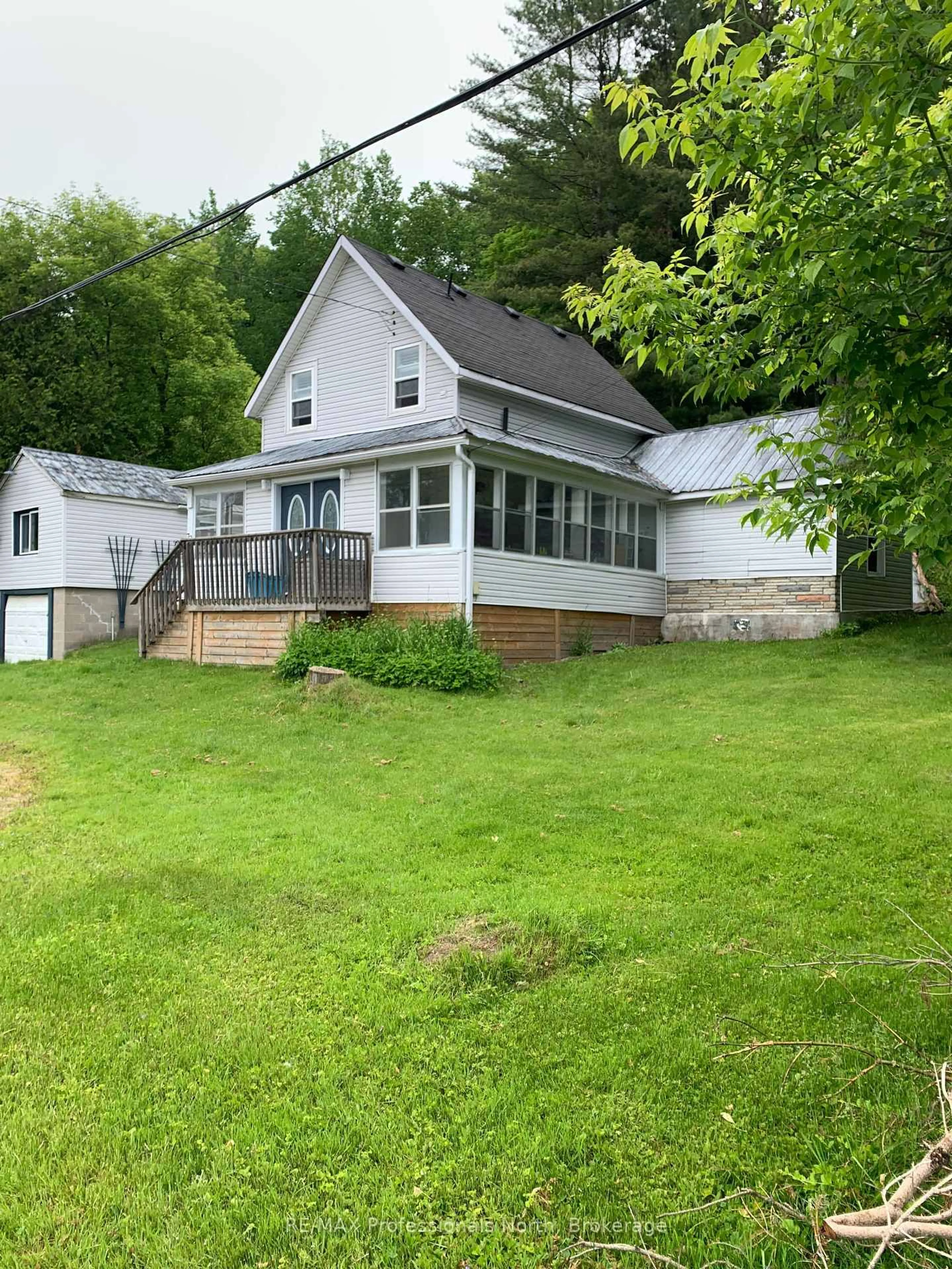 A pic from outside/outdoor area/front of a property/back of a property/a pic from drone, street for 72 Bobcaygeon Rd, Minden Hills Ontario K0M 2K0