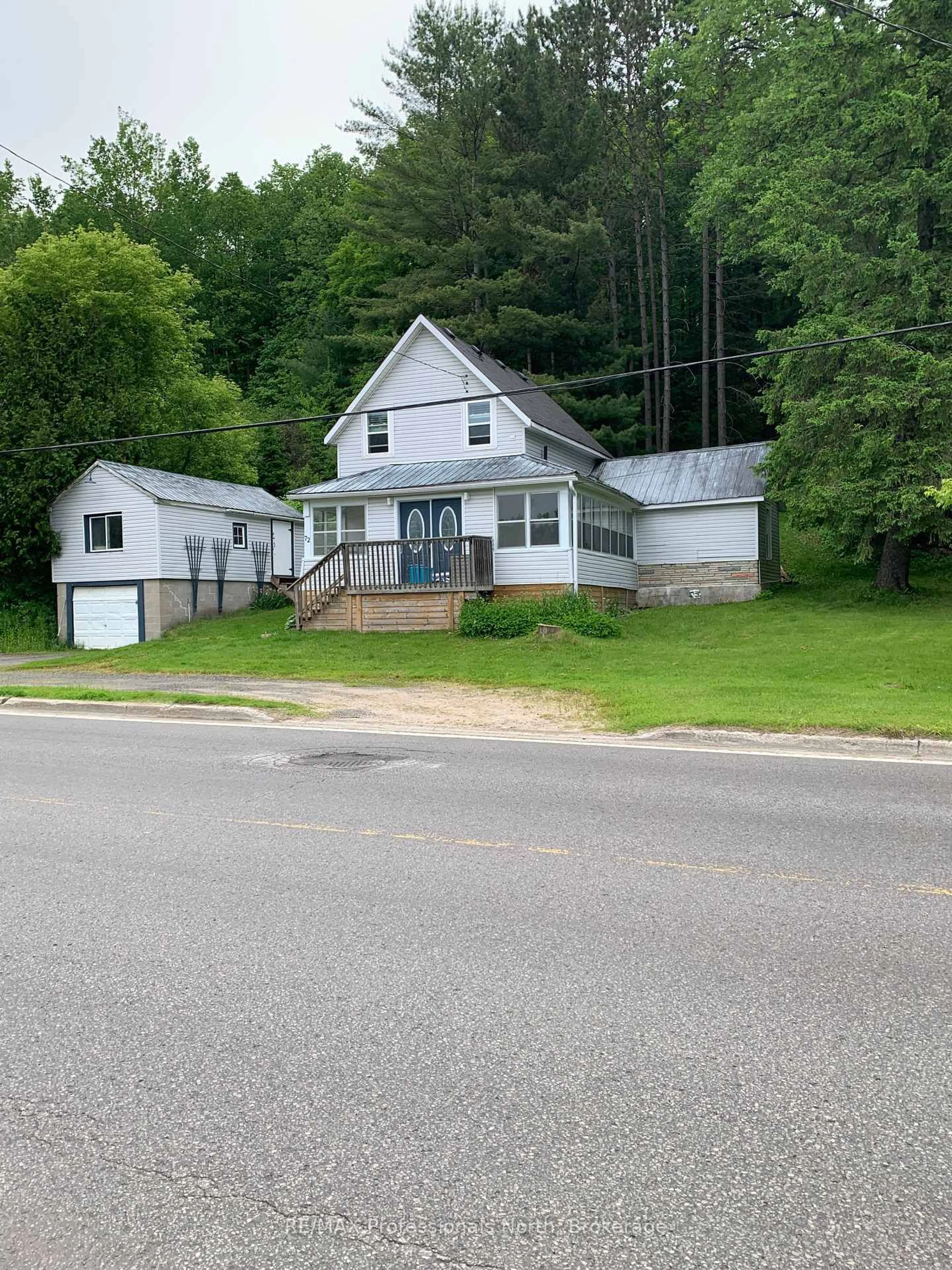 A pic from outside/outdoor area/front of a property/back of a property/a pic from drone, street for 72 Bobcaygeon Rd, Minden Hills Ontario K0M 2K0