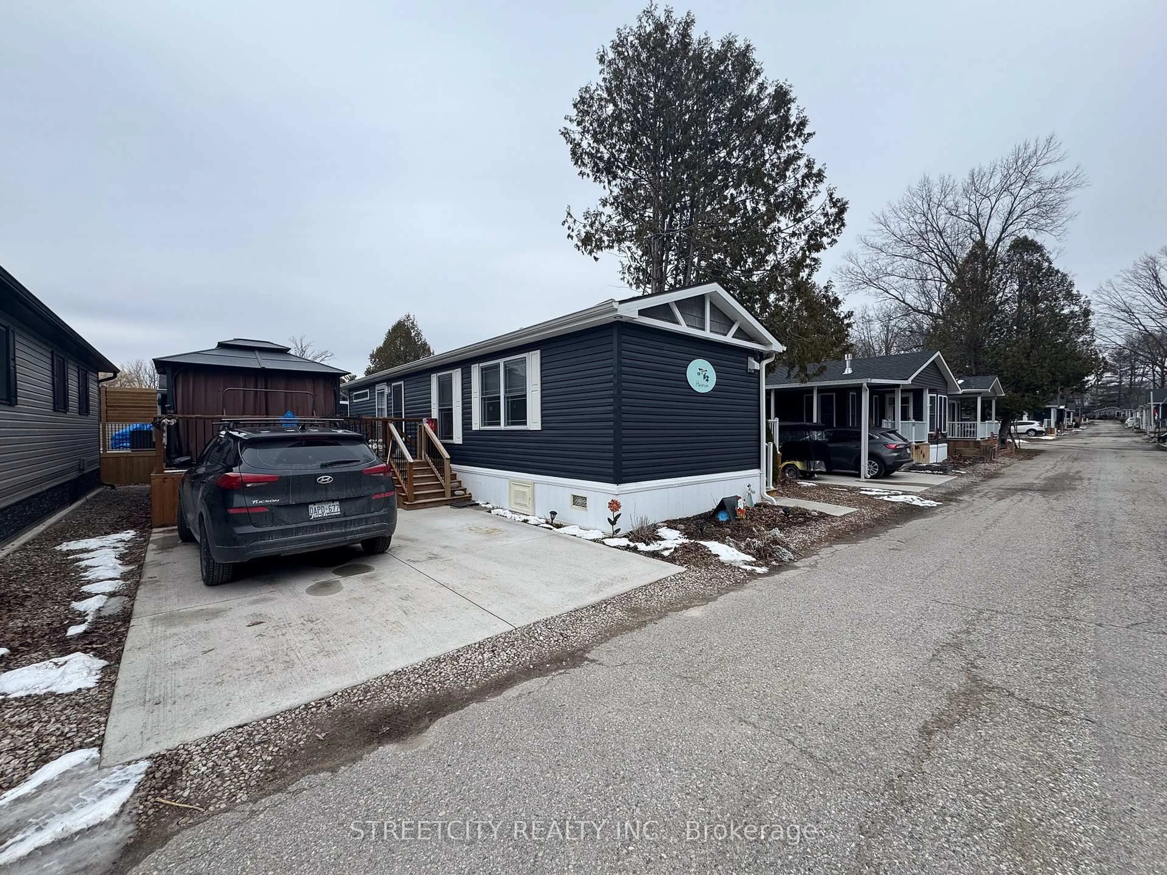 Home with vinyl exterior material, street for 22790 Amiens Rd, Middlesex Centre Ontario N0L 1R0