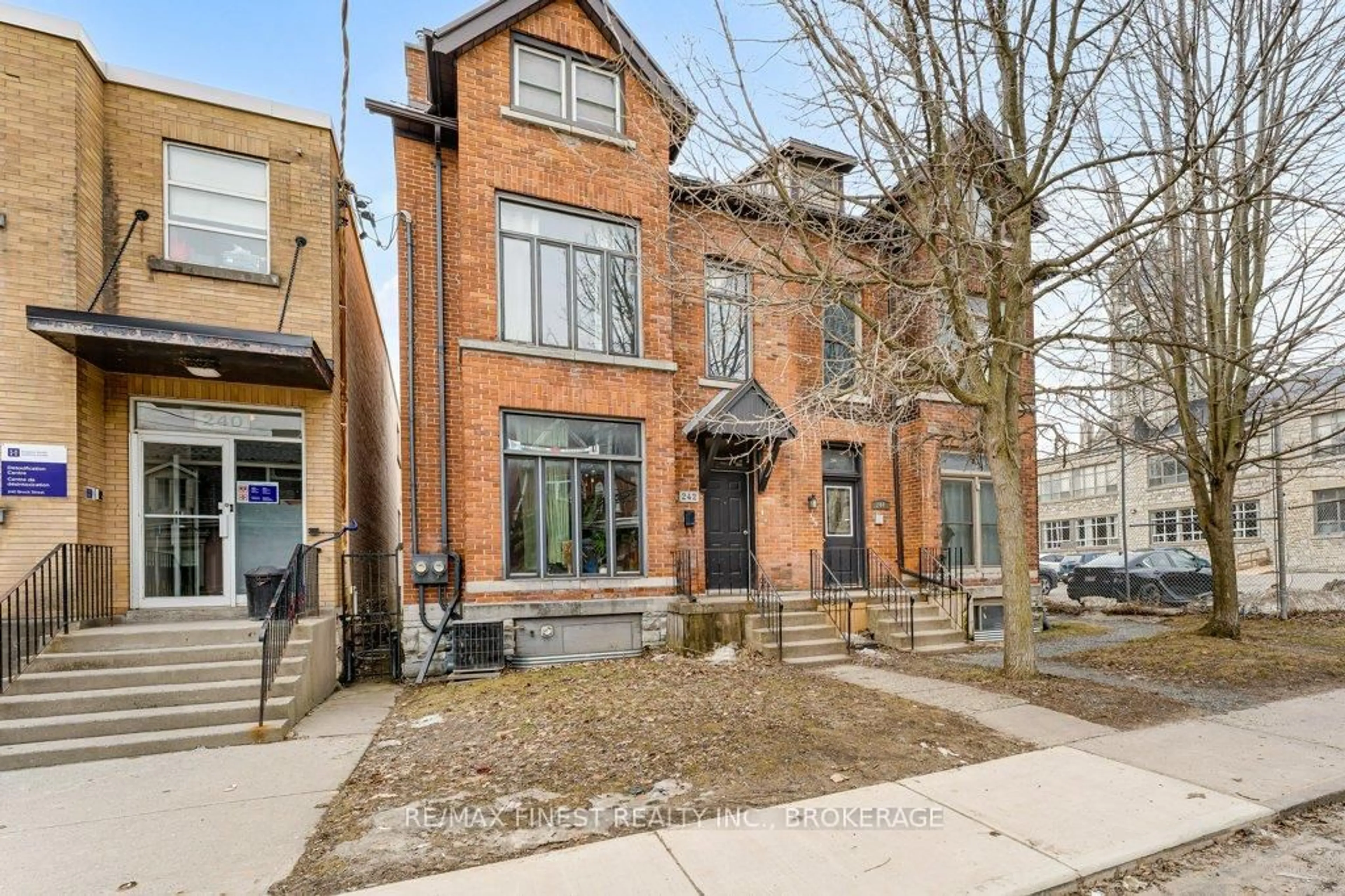 Home with brick exterior material, street for 242 Brock St, Kingston Ontario K7L 1S4