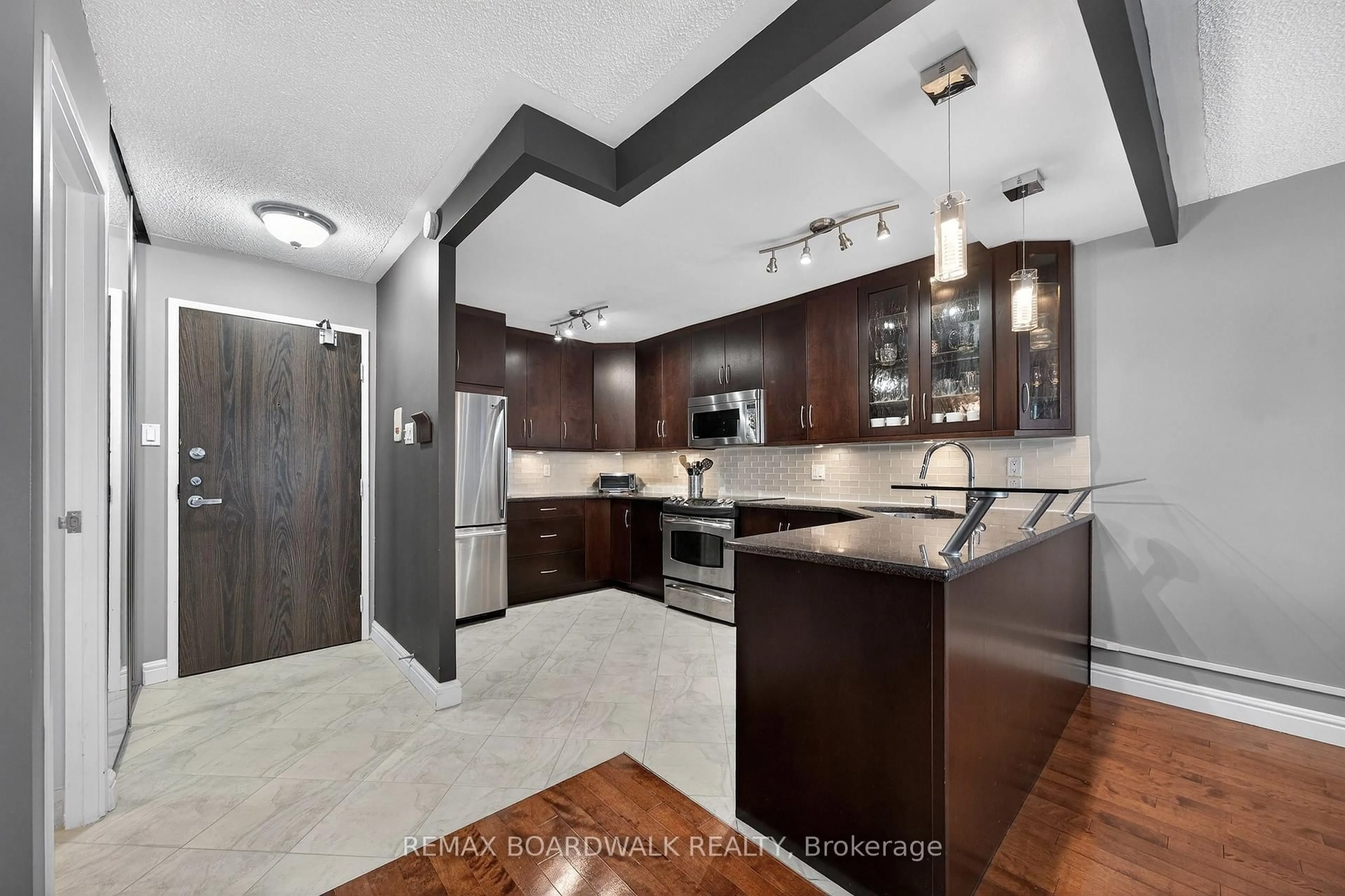 Open concept kitchen, ceramic/tile floor for 1785 Frobisher Lane #704, Ottawa Ontario K1G 3T7