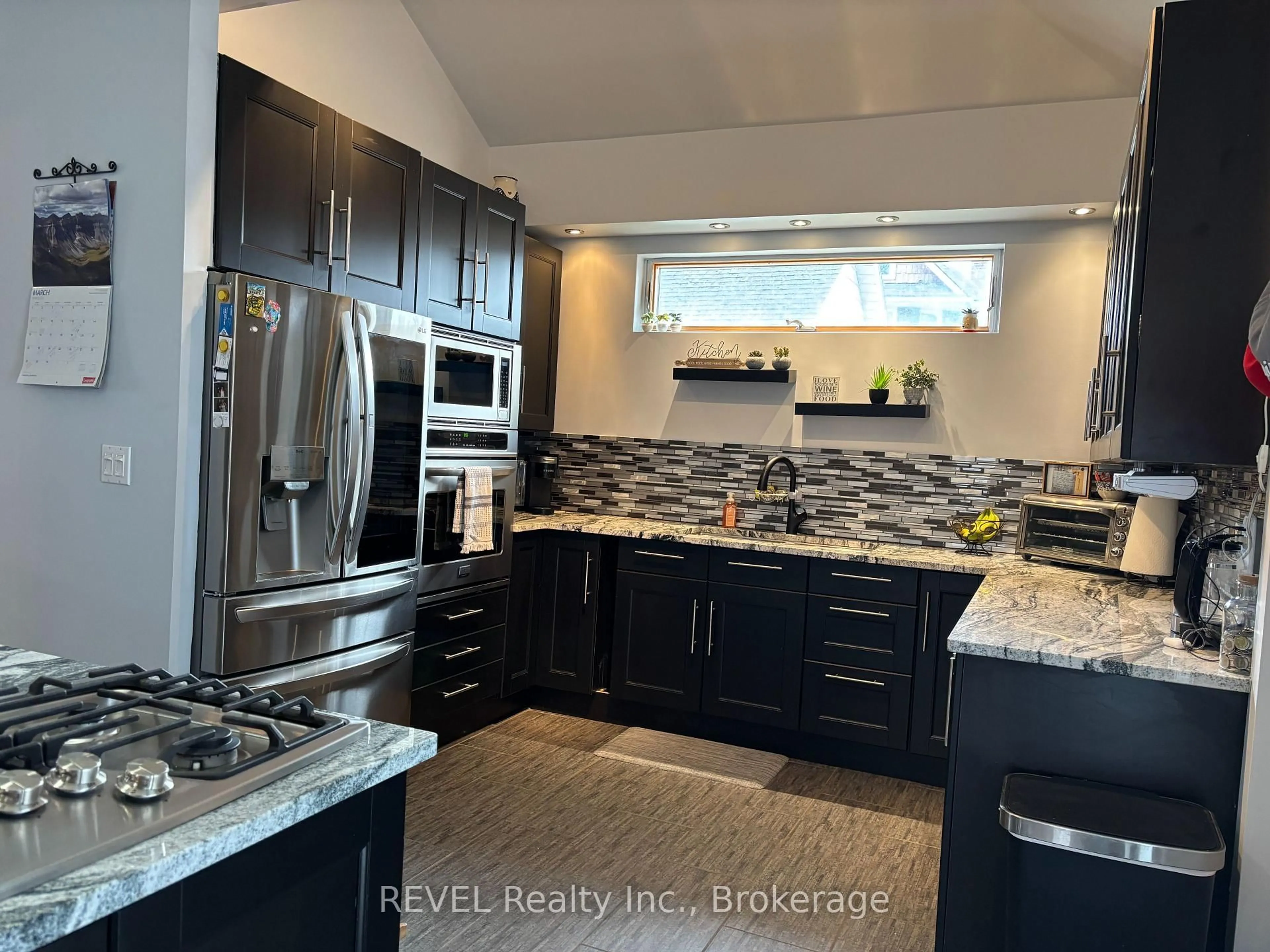 Open concept kitchen, ceramic/tile floor for 92-94 Kent St, Port Colborne Ontario L3K 2Z5