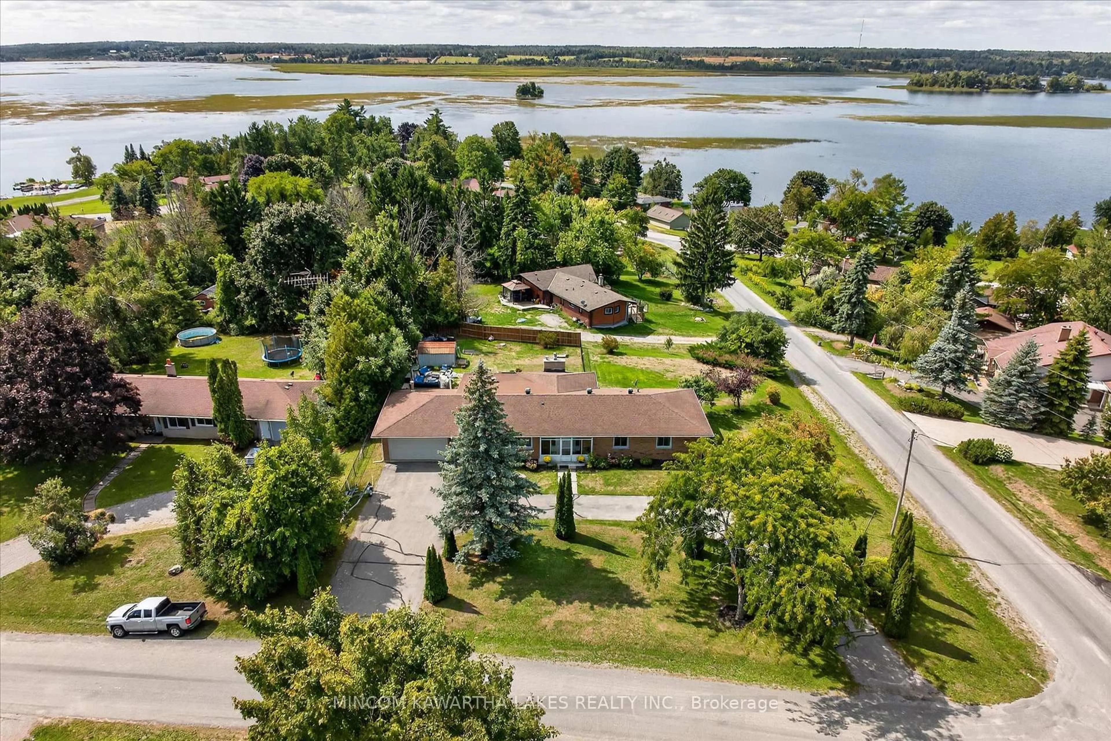 A pic from outside/outdoor area/front of a property/back of a property/a pic from drone, water/lake/river/ocean view for 200 Kildeer Lane, Selwyn Ontario K0L 1T0