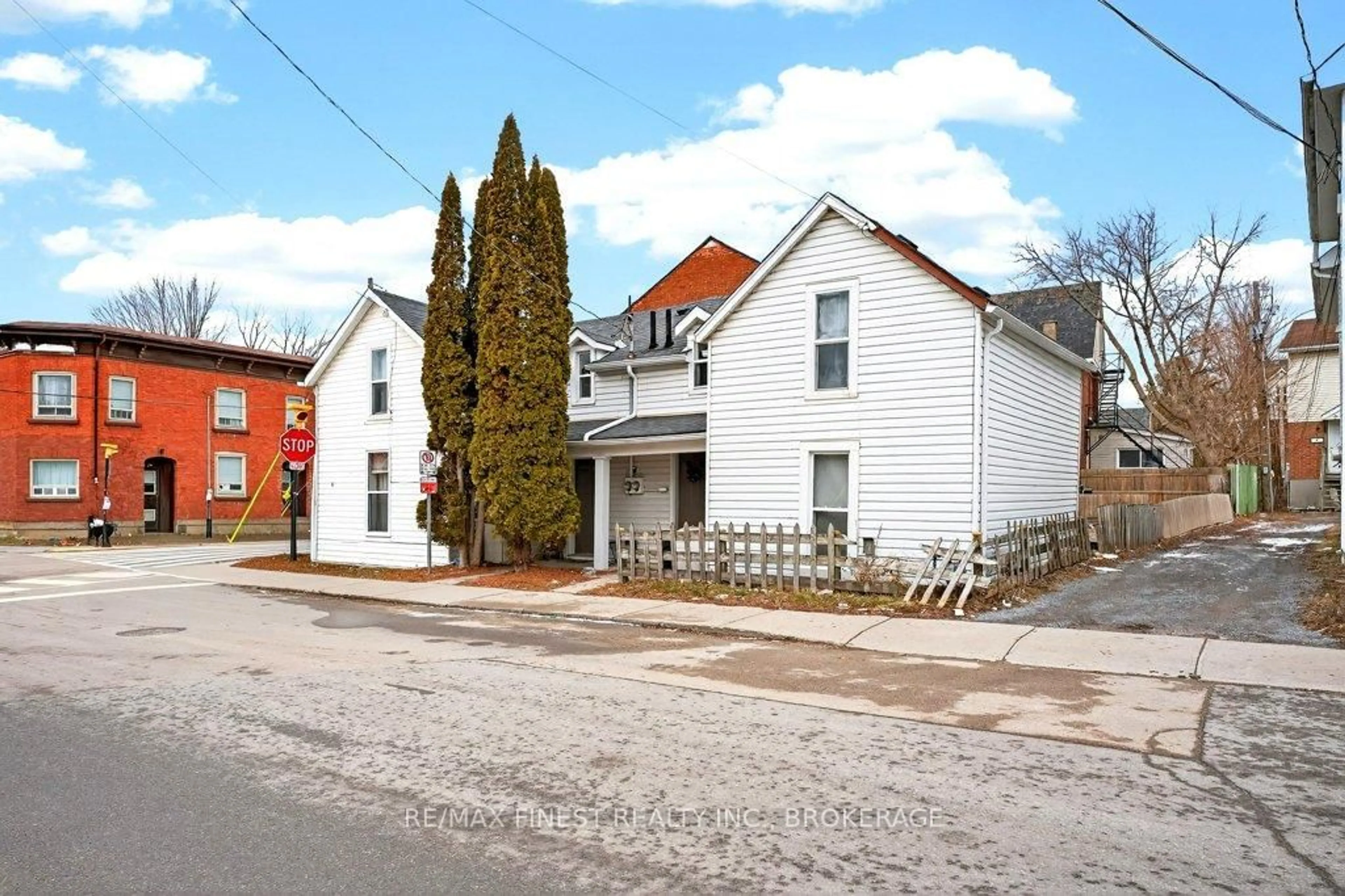 Home with brick exterior material, street for 255-257 Earl St, Kingston Ontario K7L 2H6