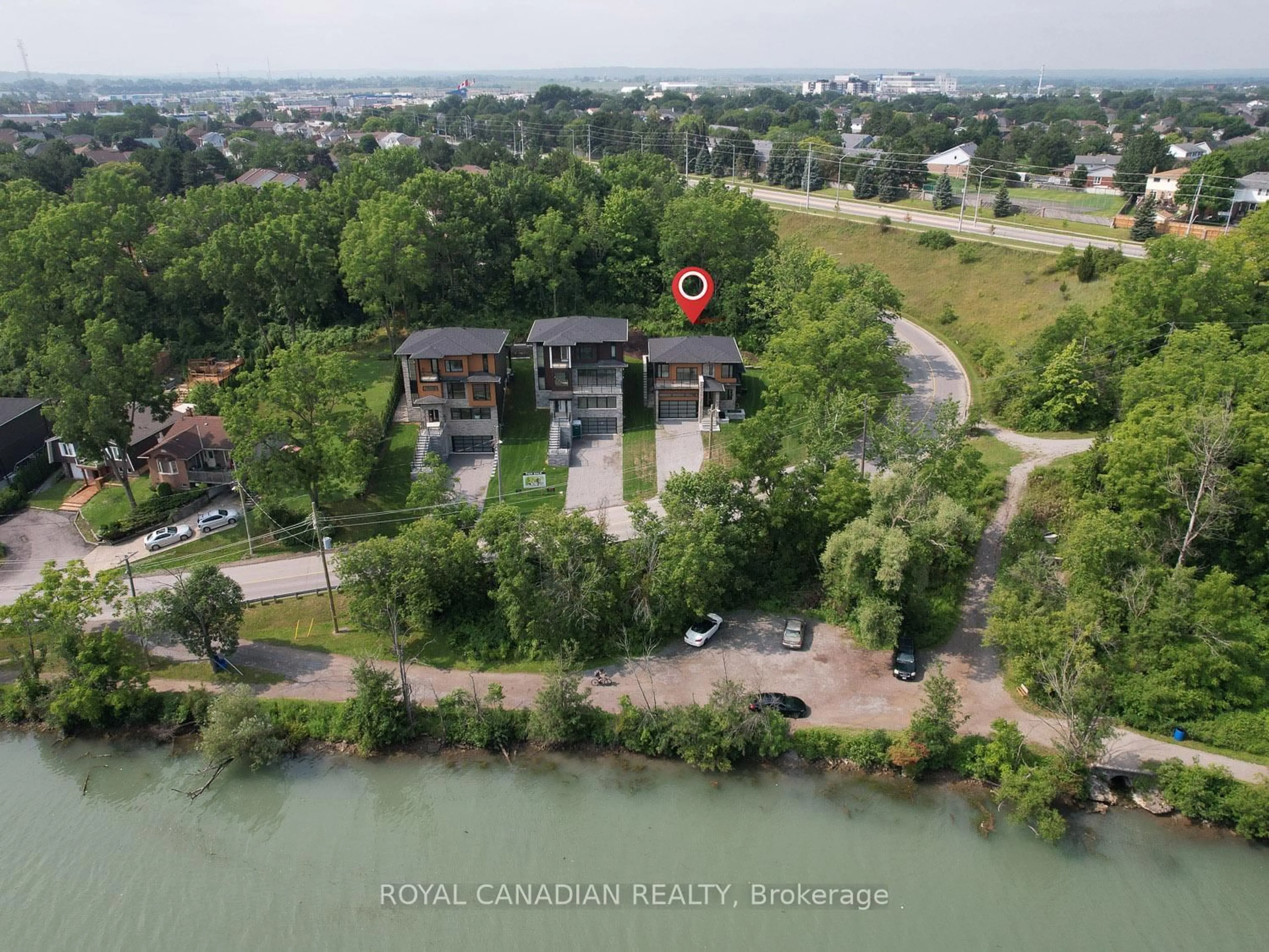 A pic from outside/outdoor area/front of a property/back of a property/a pic from drone, water/lake/river/ocean view for 119 Welland Vale Rd, St. Catharines Ontario L2S 3Y2