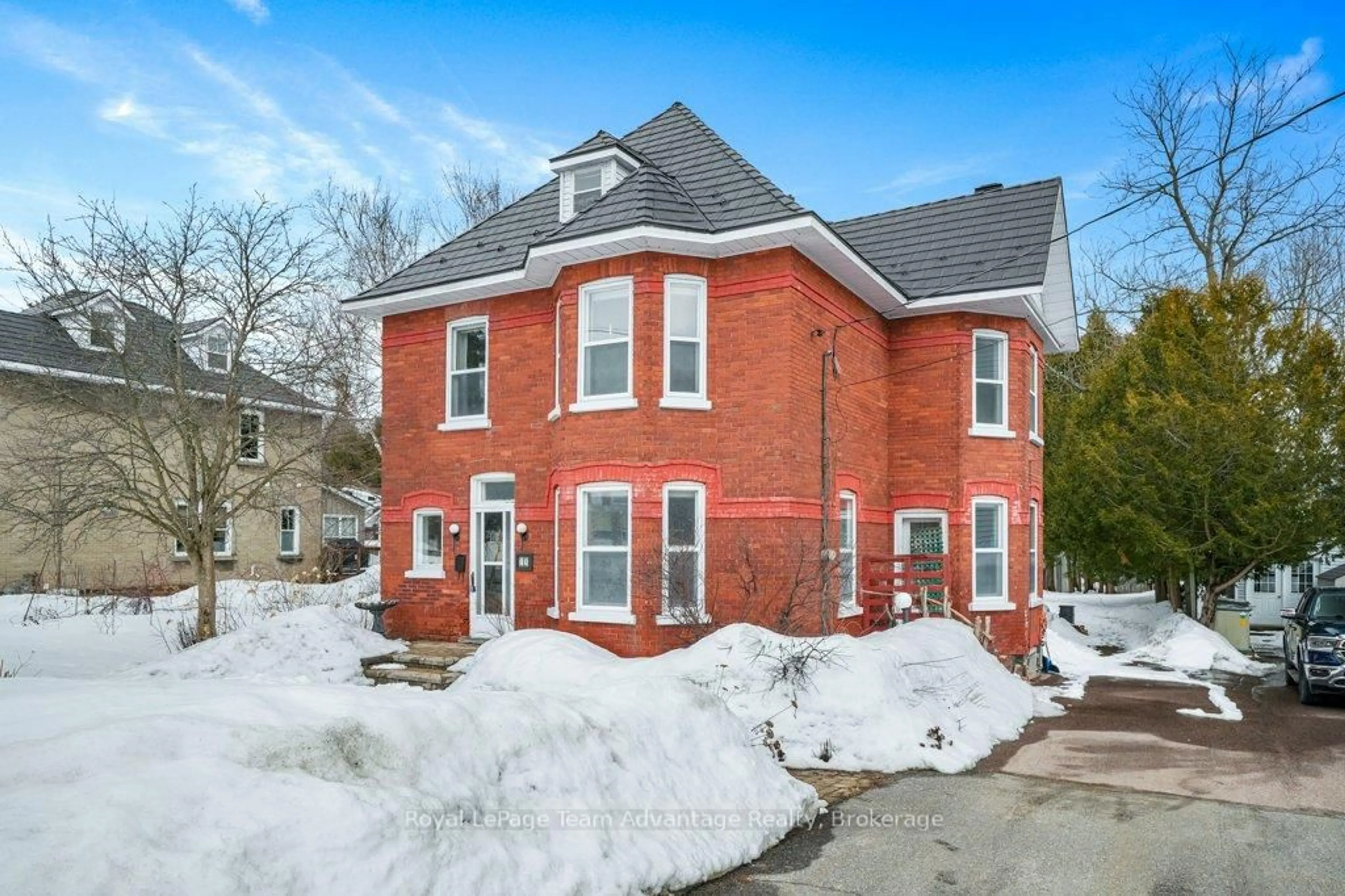 Home with brick exterior material, street for 79 Gibson St, Parry Sound Ontario P2A 1X4