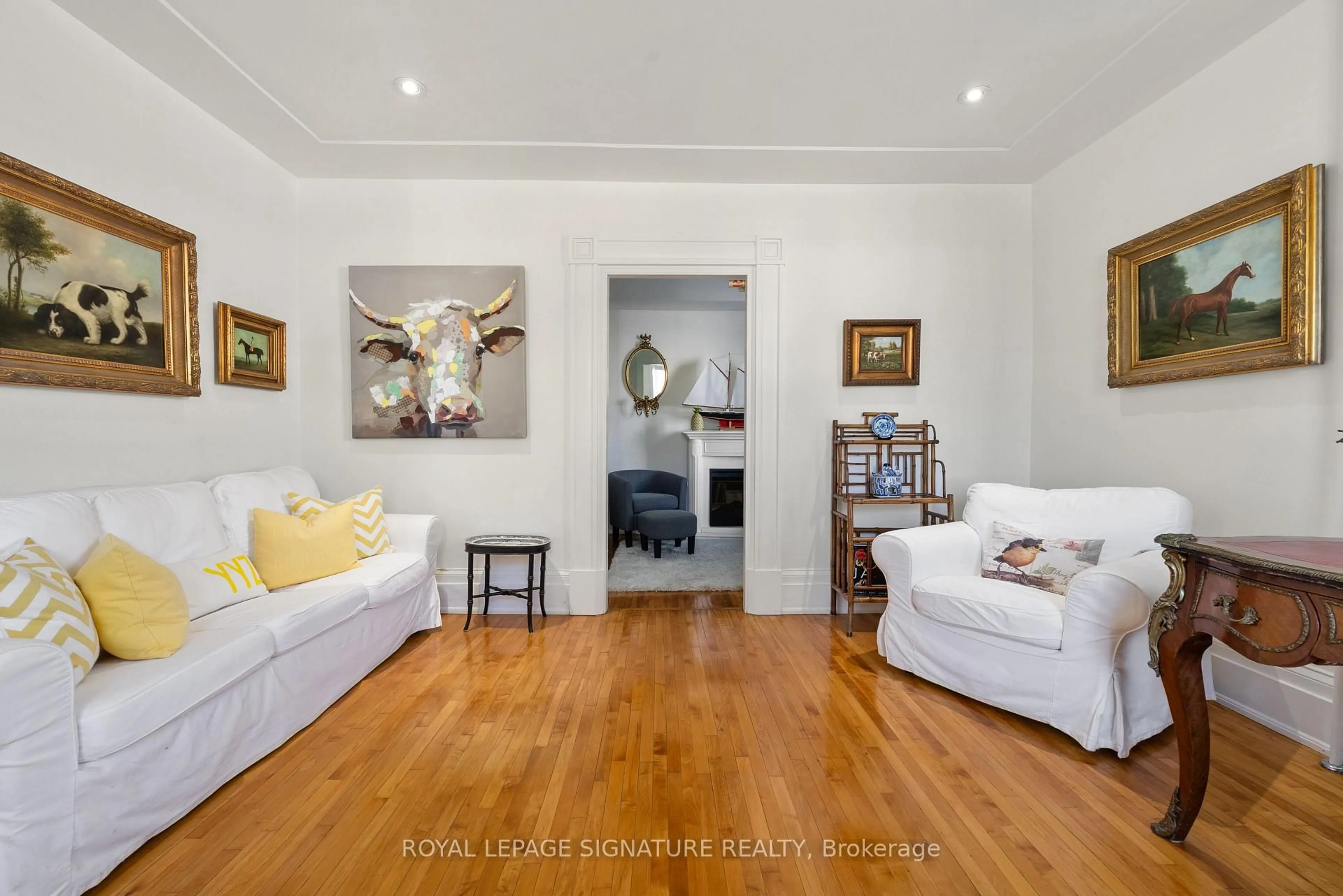 Living room with furniture, wood/laminate floor for 3804 Main St, Lincoln Ontario L0R 1S0