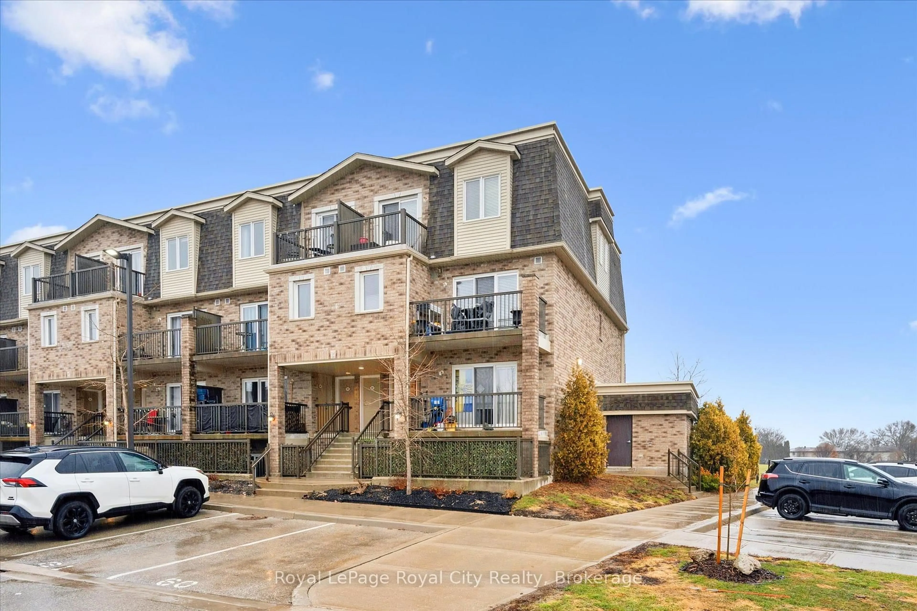 Home with brick exterior material, street for 35 Mountford Dr #85, Guelph Ontario N1E 0G6