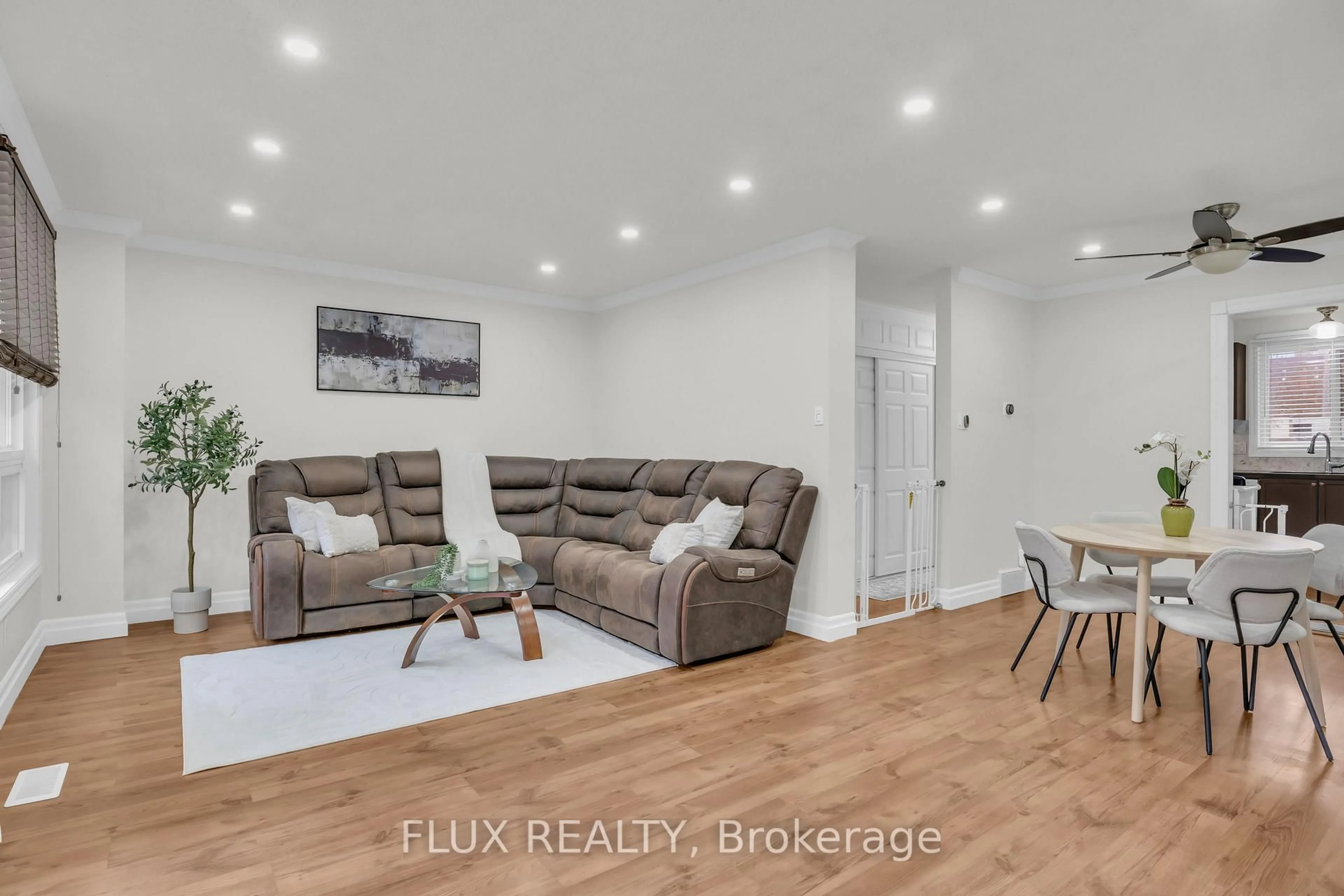 Living room with furniture, wood/laminate floor for 175 Siebert Ave #17, Kitchener Ontario N2C 2M1