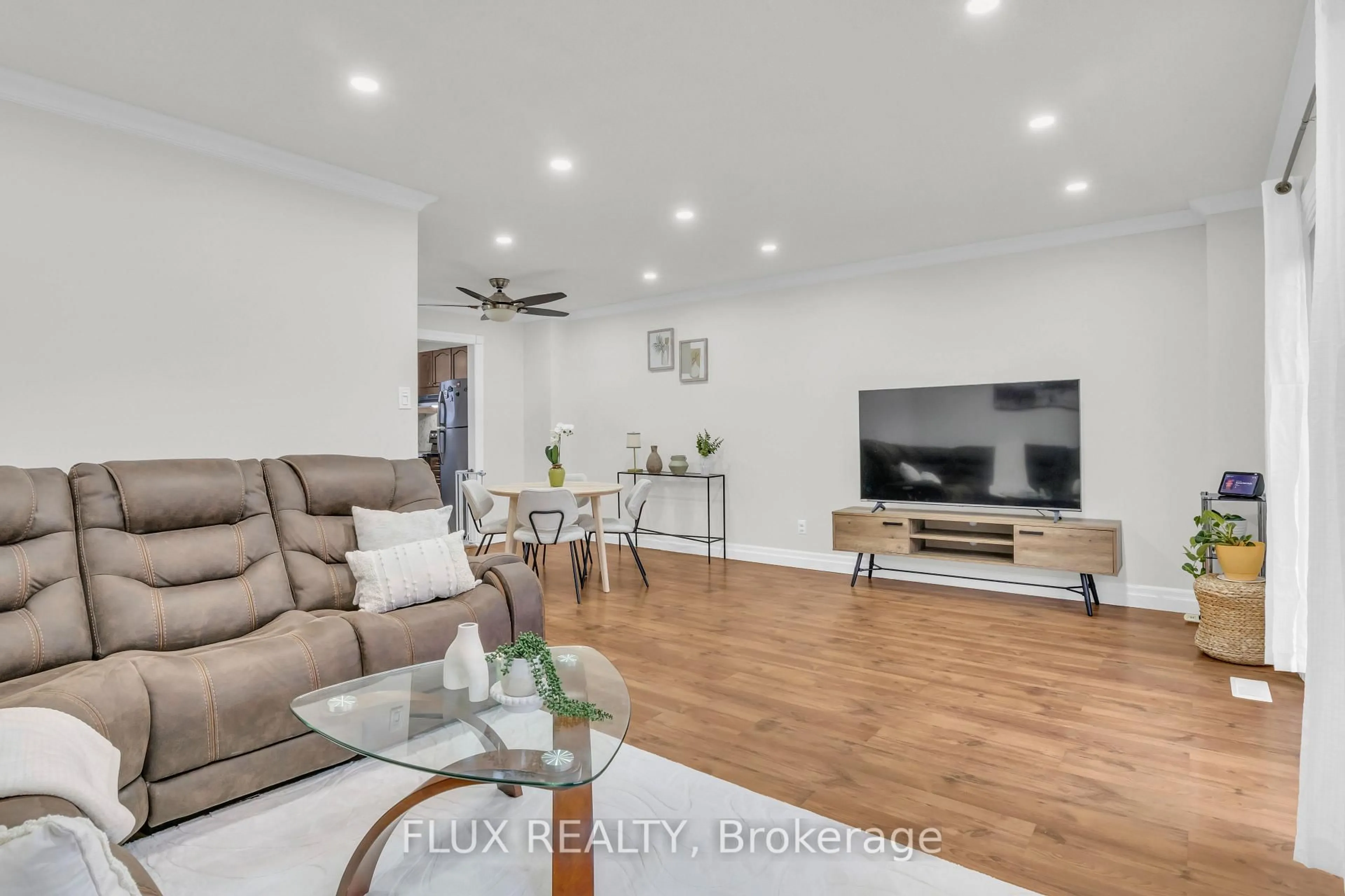 Living room with furniture, wood/laminate floor for 175 Siebert Ave #17, Kitchener Ontario N2C 2M1