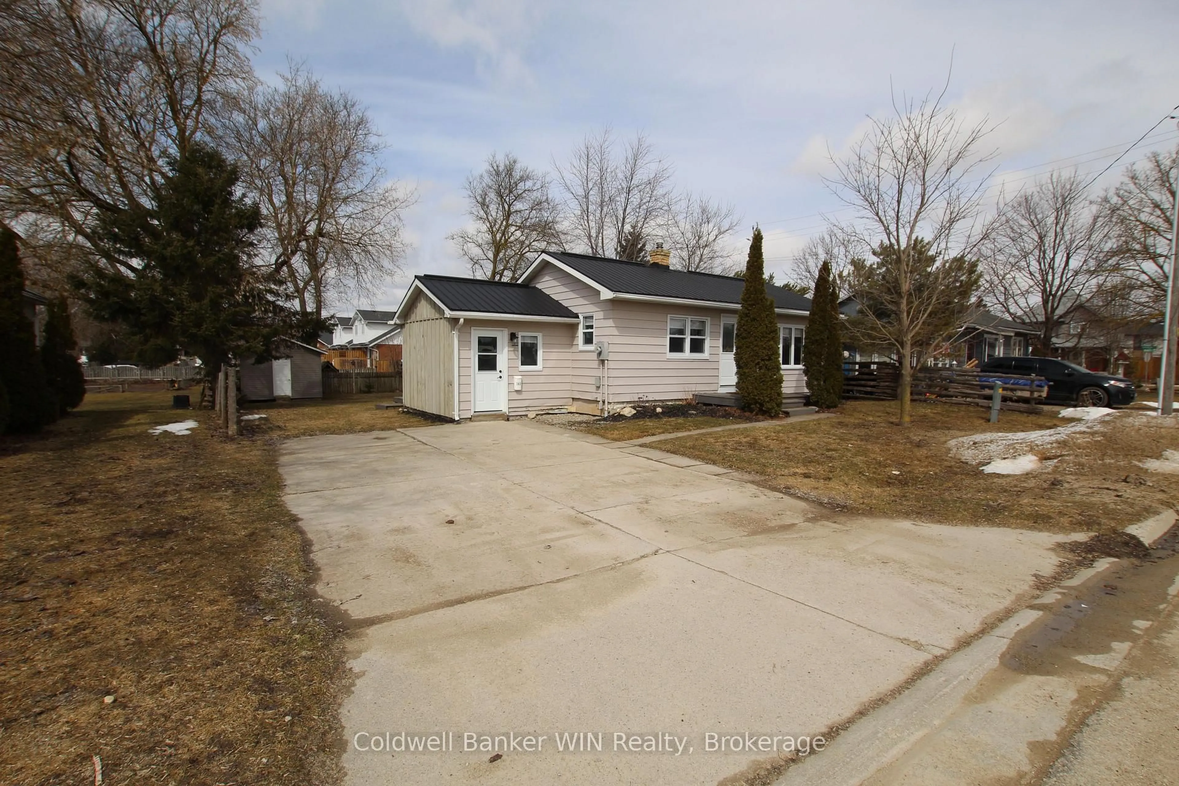 A pic from outside/outdoor area/front of a property/back of a property/a pic from drone, street for 383 Wellington St, Wellington North Ontario N0G 2L2