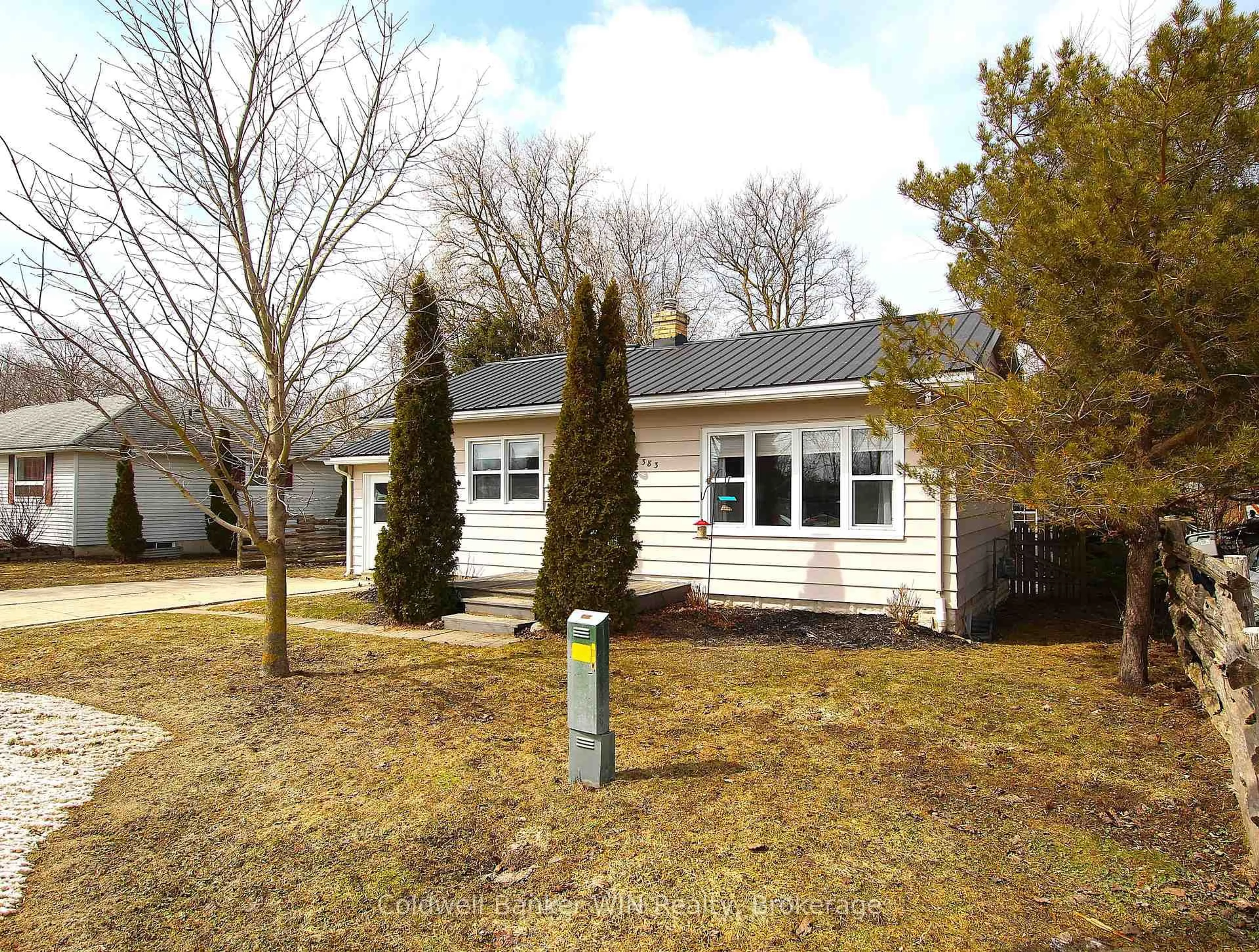 Home with vinyl exterior material, street for 383 Wellington St, Wellington North Ontario N0G 2L2