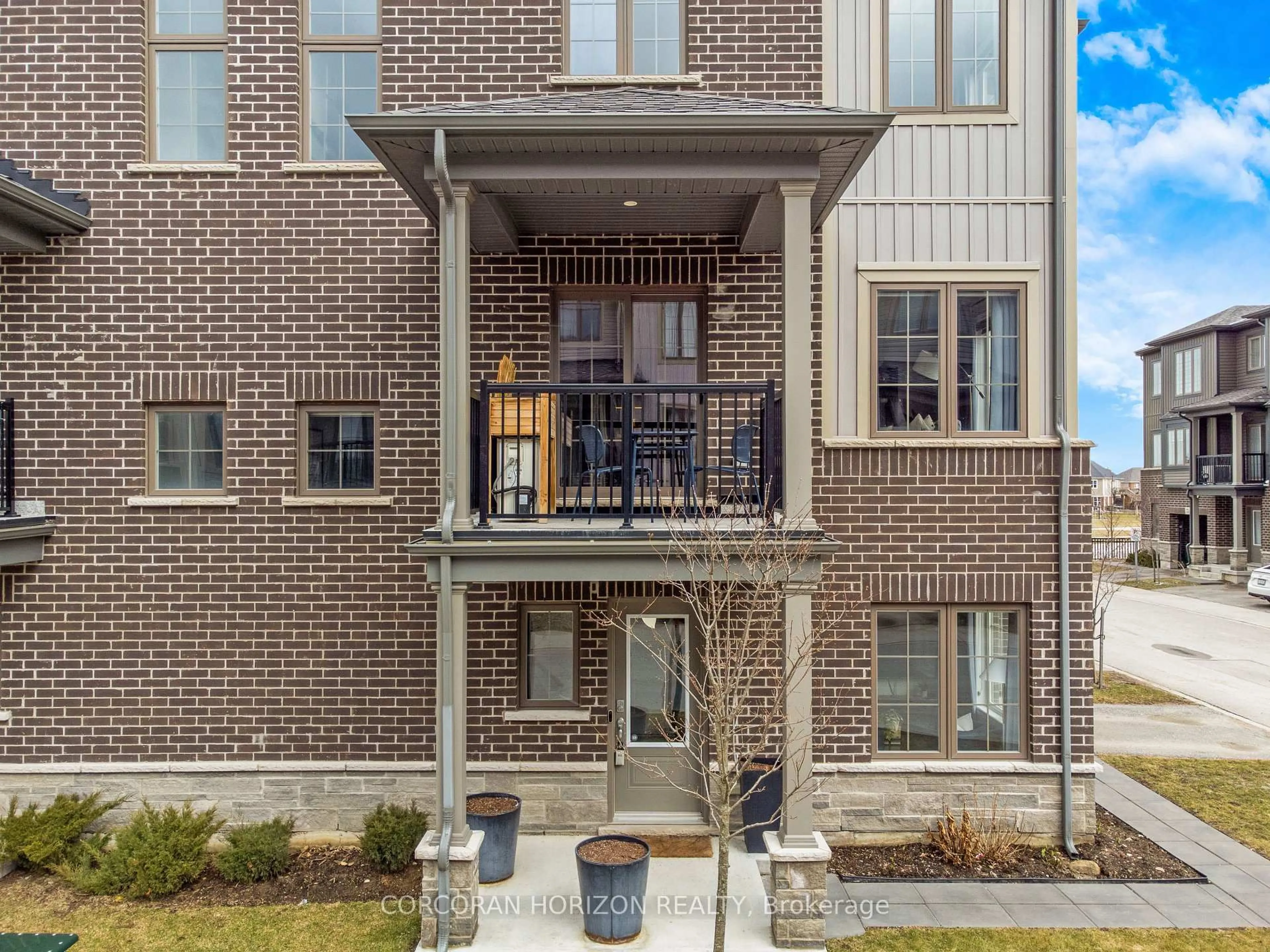 Home with brick exterior material, street for 124 Compass Tr #70, Cambridge Ontario N3E 0E3