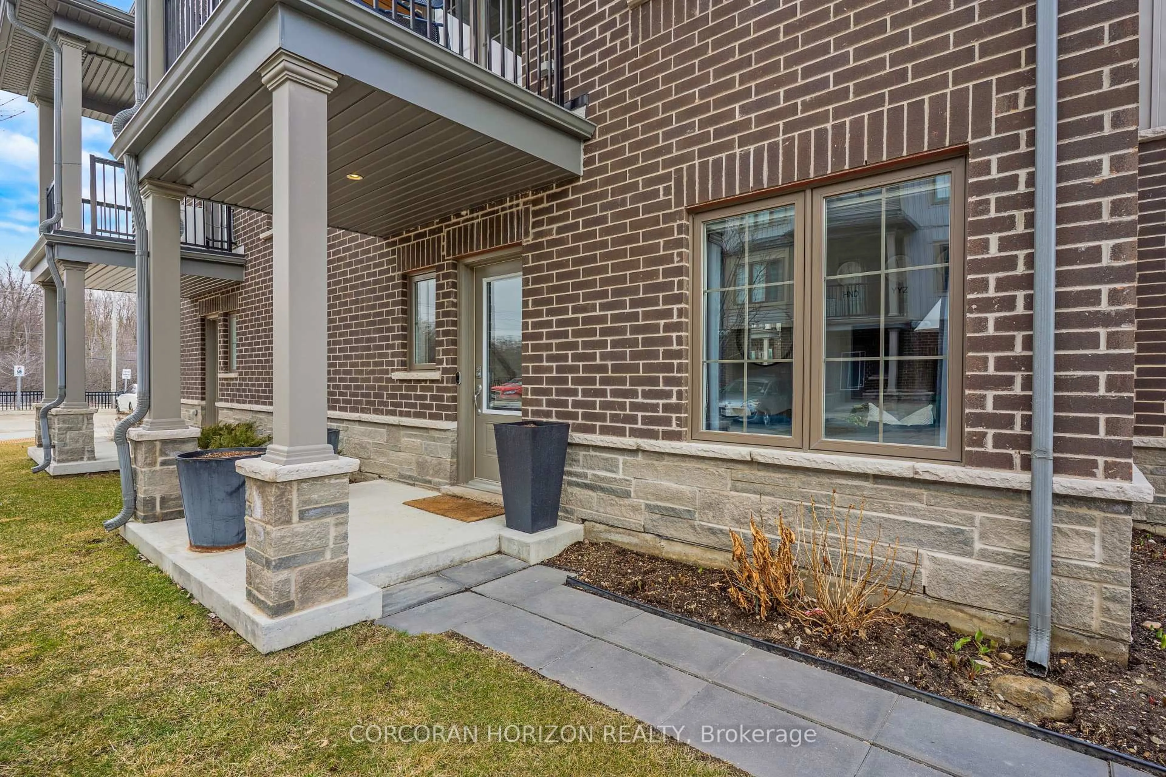 Home with brick exterior material, street for 124 Compass Tr #70, Cambridge Ontario N3E 0E3