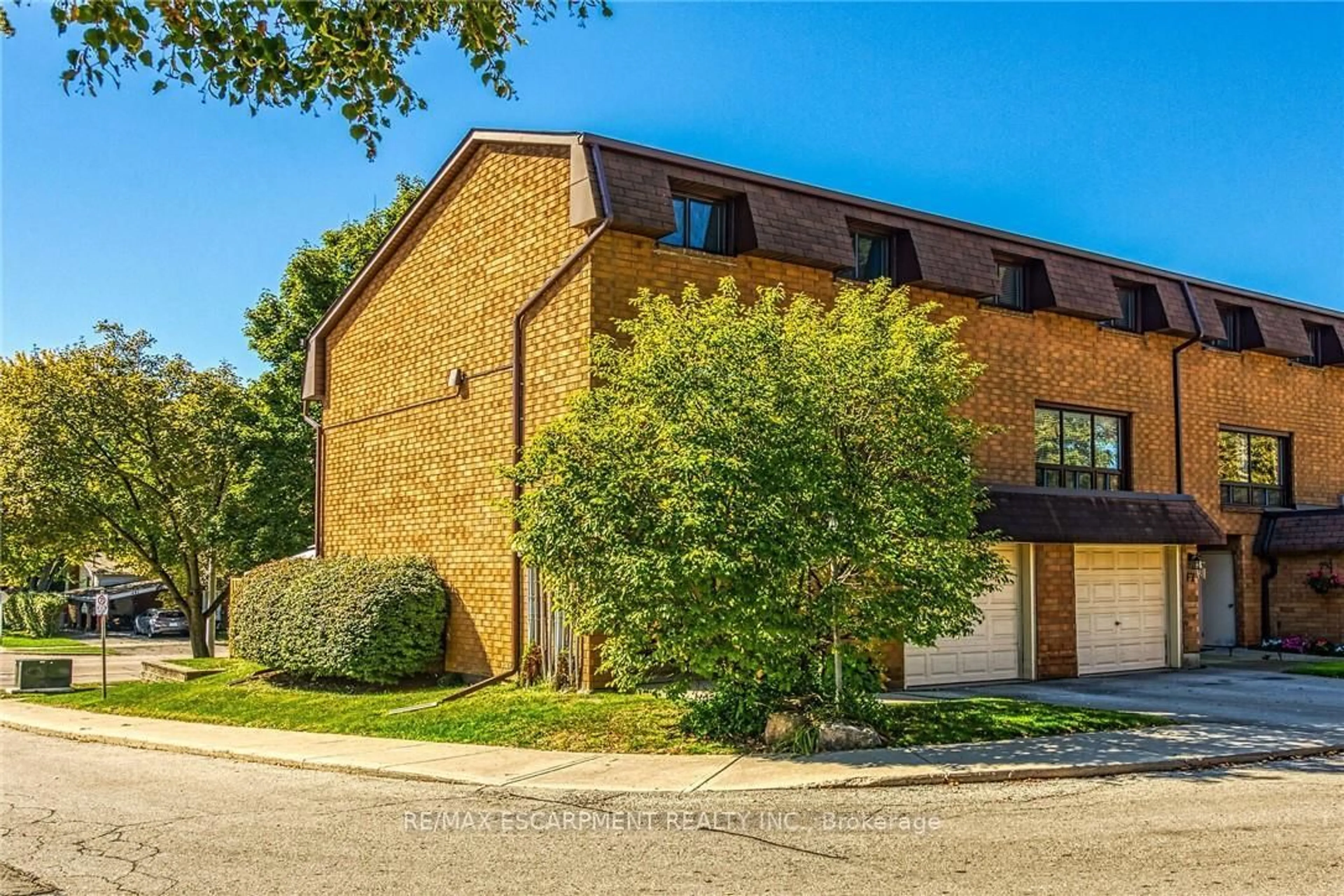 Home with brick exterior material, street for 500 Stone Church Rd #F8, Hamilton Ontario L9B 1R2