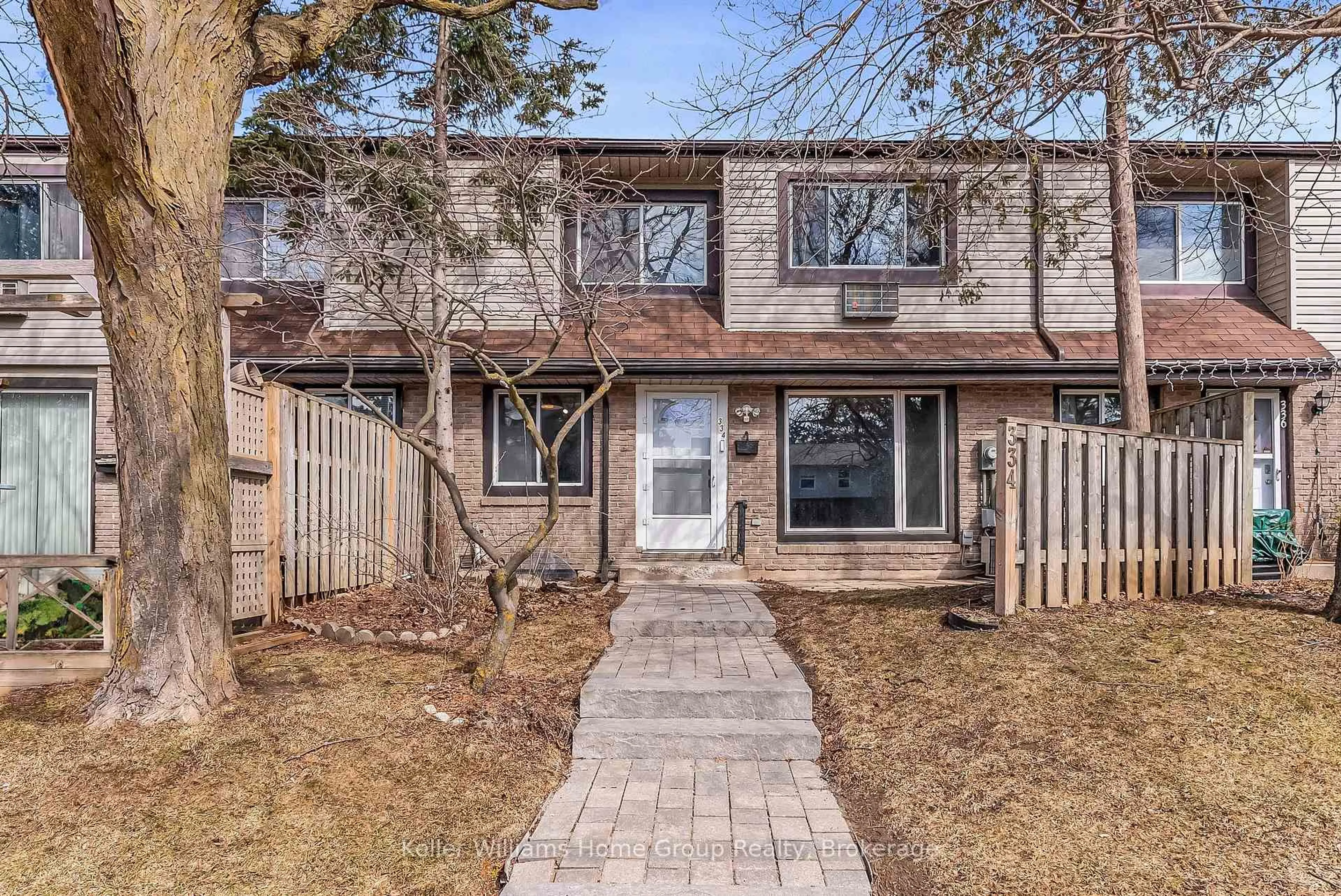 A pic from outside/outdoor area/front of a property/back of a property/a pic from drone, street for 334 Scottsdale Dr #n/a, Guelph Ontario N1G 2Z8