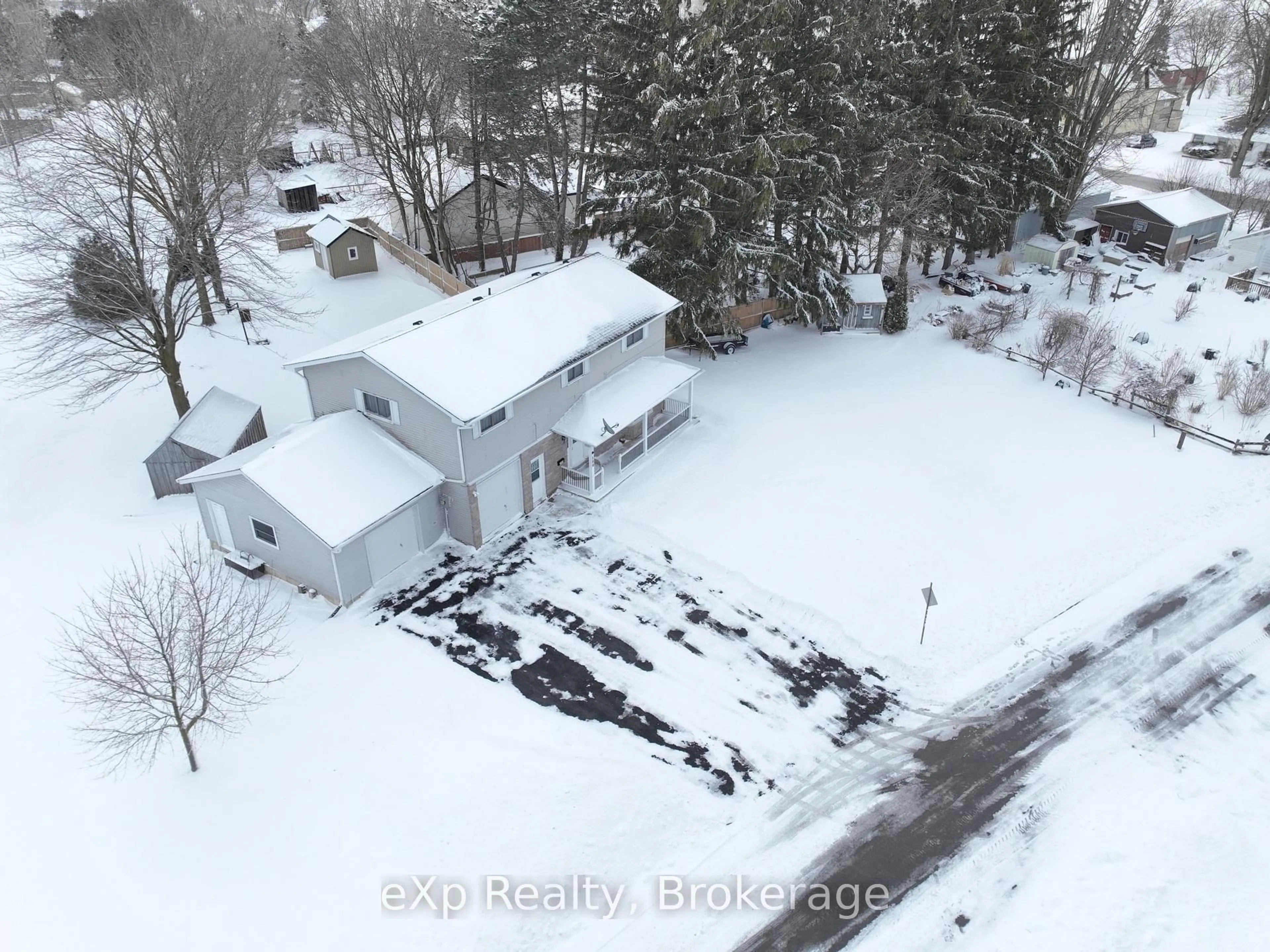 A pic from outside/outdoor area/front of a property/back of a property/a pic from drone, street for 100 Arthur St, Minto Ontario N0G 2P0
