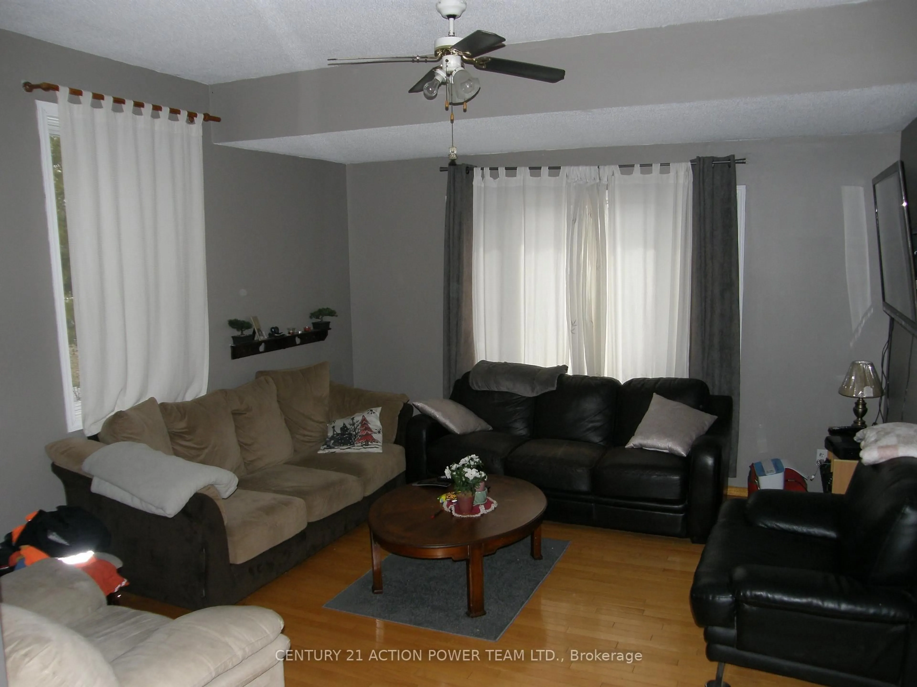 Living room with furniture, wood/laminate floor for 14419 Concession 11-12 Rd, North Stormont Ontario K0A 1R0