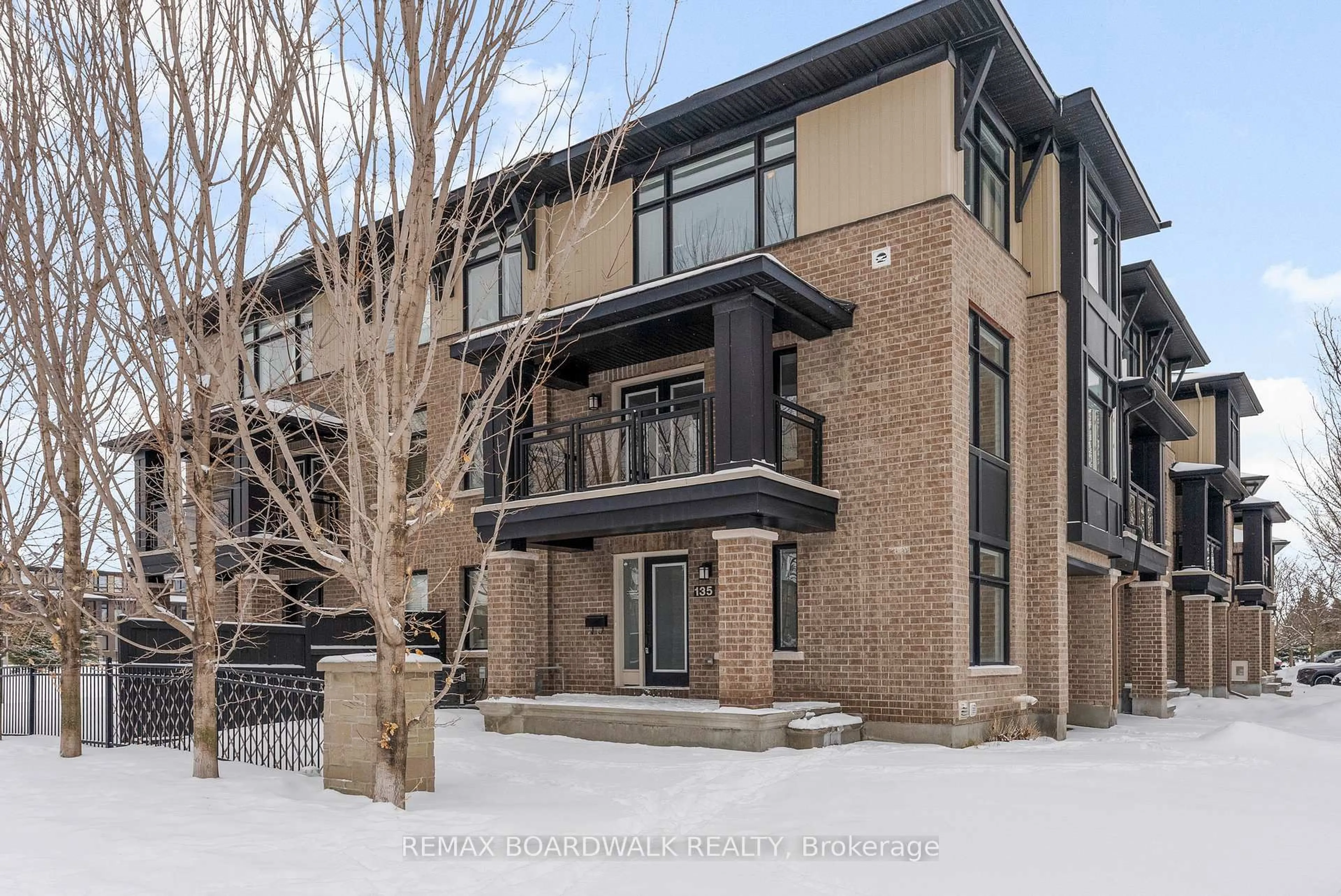 Home with brick exterior material, street for 135 Wild Senna Way, Ottawa Ontario K2J 5Z7