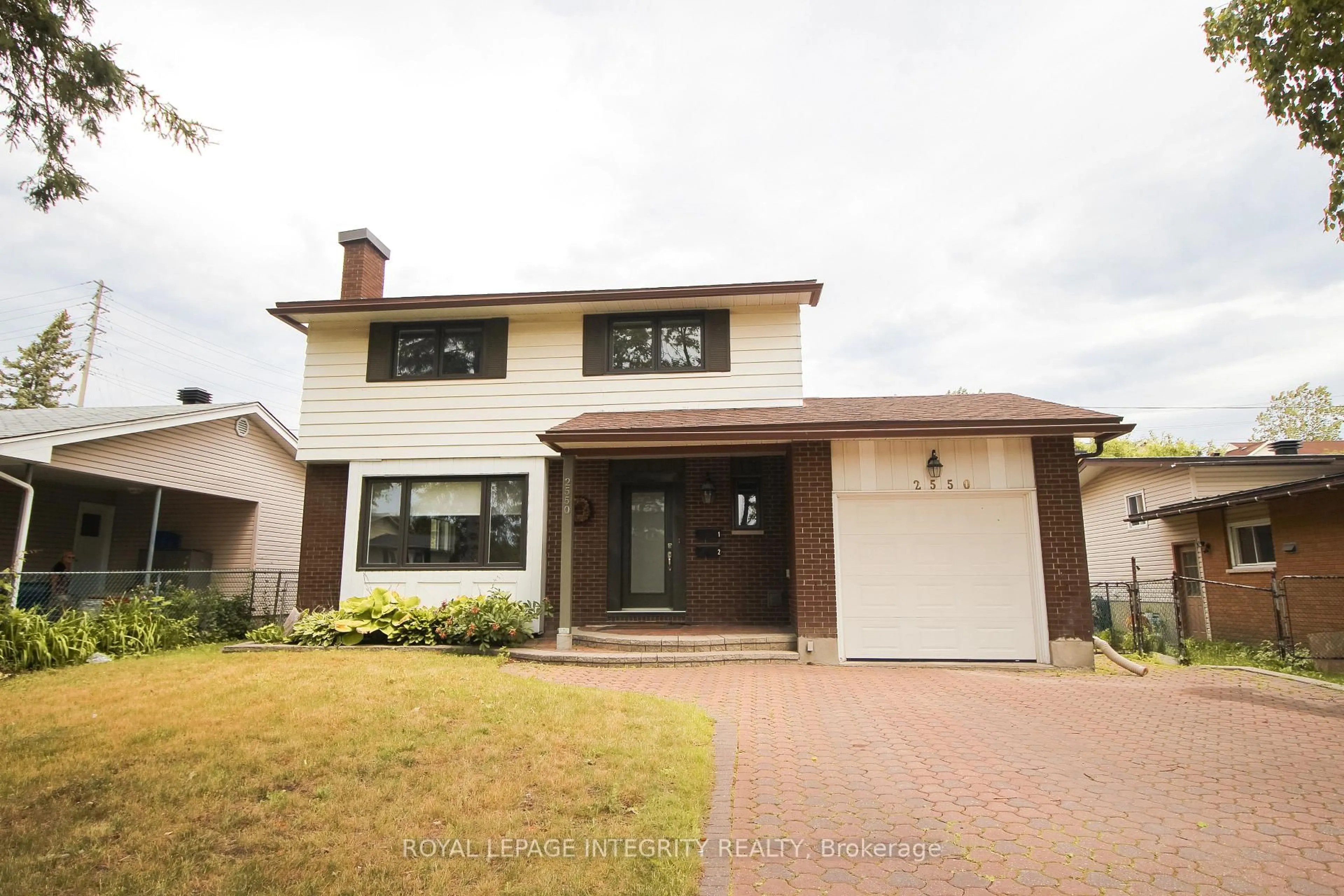 Home with brick exterior material, street for 2550 Traverse Dr, Ottawa Ontario K1V 9B1