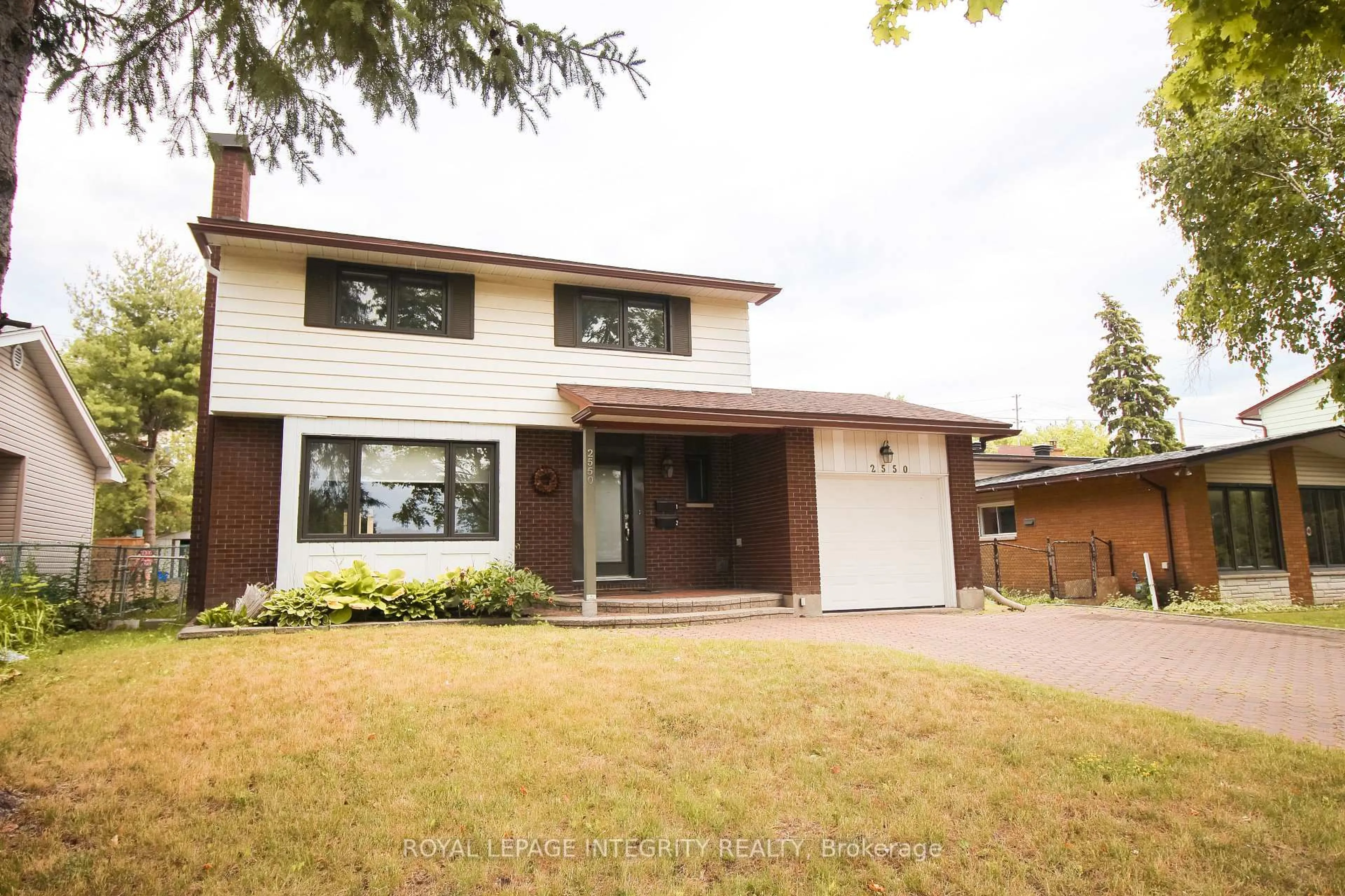 Home with brick exterior material, street for 2550 Traverse Dr, Ottawa Ontario K1V 9B1